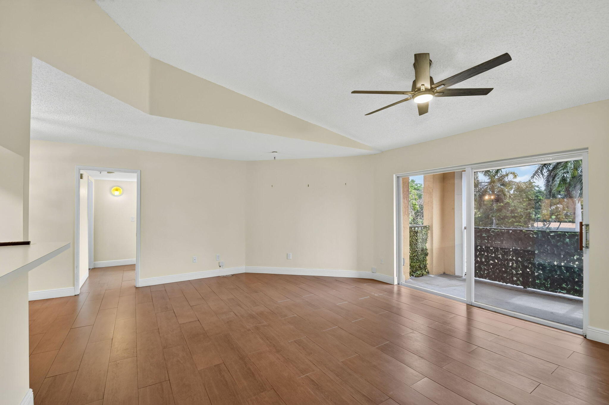 Rare opportunity to own one of the highly coveted true one-bedroom, one-bath residences in the desirable Yacht Club community. Soaring vaulted ceilings fill the home with natural light, creating a bright, open, and inviting atmosphere. The oversized living area offers flexible space ideal for a home office, reading nook, or additional seating, while the dedicated dining area is perfect for entertaining. The spacious primary bedroom features a large walk-in closet, and the beautifully updated interior showcases newer appliances, newer A/C, newer water heater, a renovated bathroom, and custom finishes throughout. Thoughtfully designed and meticulously maintained, this move-in-ready gem offers the perfect blend of comfort, style, and value. Enjoy resort-style living every day!