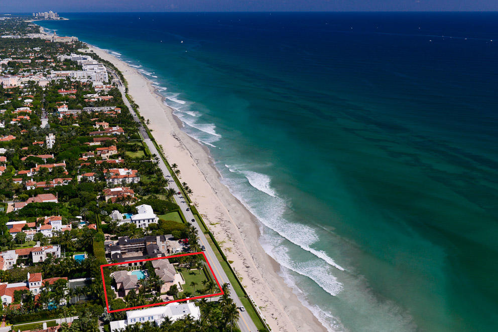 Stunning Estate Section oceanfront home. Oversized ¾ acre +/- lot with large pool and beautifully manicured grounds. Dramatic living room and dining room with commanding ocean views. Elaborate ocean facing master suite with spectacular ocean views includes balcony, office, exercise room, sitting room, and dual baths and closets. Use of tunnel access to beach.