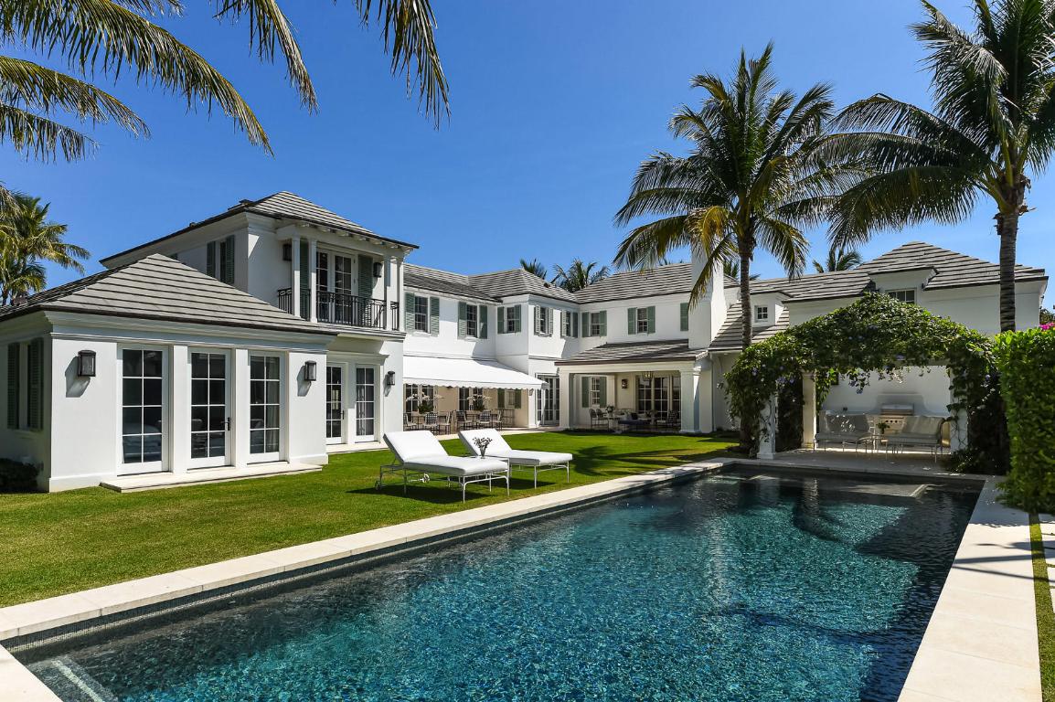 Gorgeous 7BR/8.1BA North End Estate on oversized South side lot. Built new in 2017 and featuring 3 car garage, wine room, elevator, library, and stunning architectural details throughout. Excellent floorplan with great proportions. Beautiful gourmet kitchen opens to family room and breakfast area. Butler's pantry leads to formal dining room overlooking garden. Gorgeous living room with fireplace. First floor Owner's Suite features dual baths and large closets. Intricately landscaped outdoor spaces include loggia with gas fireplace, 60' pool with sunshelf, summer kitchen, and beautiful pergola. Fantastic North End location on quiet corner, just one block to the beach and Lake Trail.