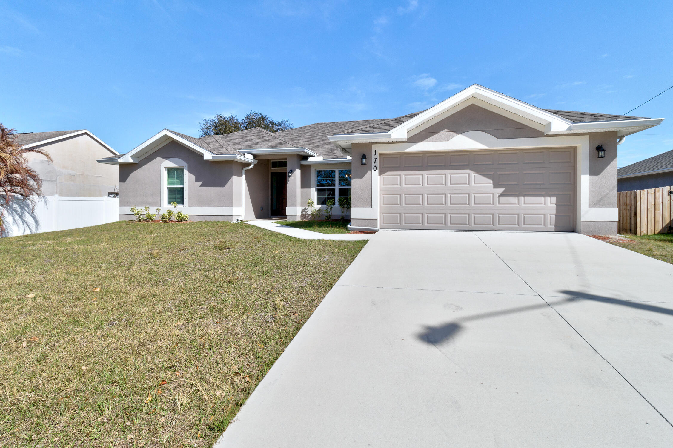 Welcome to this move in ready 2024  4-bedroom, 3-bathroom single-family residence. This thoughtfully designed one-story home offers 2,110 square feet of finished living space, providing ample room for everyday comfort and entertaining. The open concept floor plan with high ceilings & large windows fills the home with natural light. This property presents an excellent opportunity for those seeking a well-proportioned home with multiple bedrooms and bathrooms to suit various lifestyle needs. Recent upgrades include large porcelain tile throughout, providing a clean modern look. The home backs up to a Water District easement offering a private, peaceful setting. Close to all Sebastian has to offer including the waterfront, restaurants, beaches, parks and shopping.  Convenient to I-95 and US 1