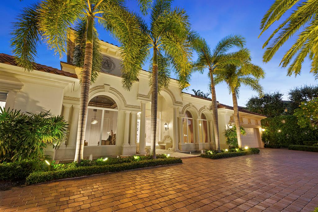 Desirable South Facing lot!! 100 feet of water frontage  on Wide Canal. 

Live in one of the most exclusive neighborhoods as recognized by Forbes - Royal Palm Yacht & Country Club. This is an amazing opportunity to own a traditional waterfront residence that features luxurious detailing throughout. With 3 bedrooms, 3 1/2  bathrooms, a custom office and bar, a personal library, this superior residence exemplifies the very essence of Florida's opulent lifestyle. The finest of materials, craftsmanship and architectural splendor are evident throughout the residence. From the custom-built mahogany bar to the European-styled baths, this estate home appeals to those with elegant tastes. Soaring, high ceilings create a light and bright ambiance throughout. The master wing, with its own comfortable office, elegant sitting room, 2 master baths and a spacious walk-in closet, also features beautiful vistas of the Intracoastal and private pool area.
 
Graceful entertaining is enjoyed in the luscious dining room that is draped with custom fabric. The gourmet kitchen includes top-of-the-line appliances and opens up to the pool area with a convenient summer kitchen.
 
Experience South Florida living under the beautifully covered loggia and relax in the refreshing pool with its cool cascading waterfall and spa. Enjoy waterfront sunsets under the custom designed gazebo.
 
Owners of this impressive waterfront residence will enjoy the convenience of docking their boat directly behind their graceful home.
 
Royal Palm Yacht and Country Club's much-desired location is conveniently situated adjacent to the world-class Boca Raton Resort and Club at the Boca Raton Inlet, thus providing direct ocean access.