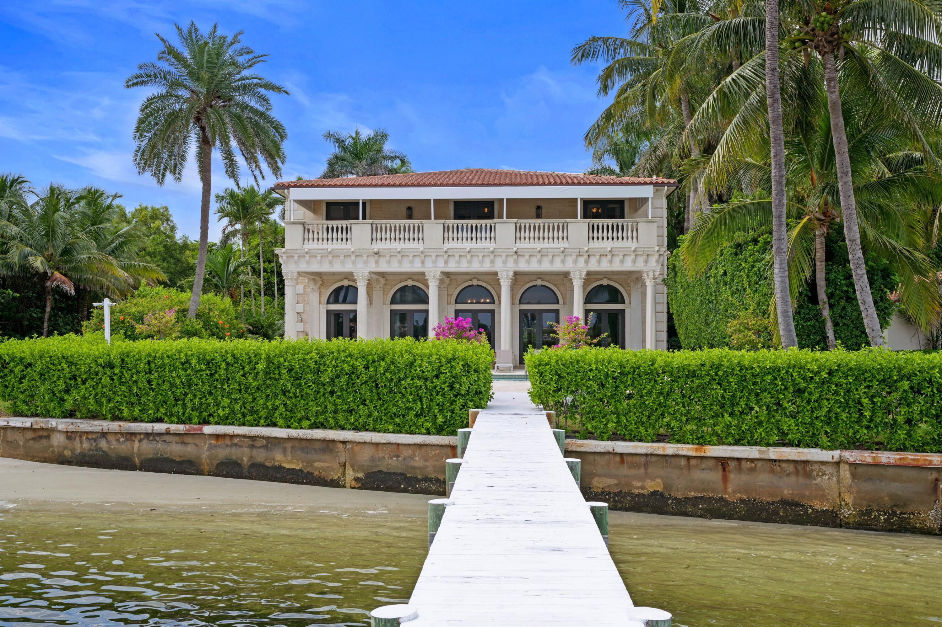 Welcome to 3240 N Flagler Drive, a waterfront residence available for annual or seasonal lease along N Flagler Drive. Offering 70 feet of direct Intracoastal frontage, the property enjoys unobstructed views across to Palm Beach Island and the Palm Beach Country Club, along with a private dock. Built in 2007, the home features 6 bedrooms, 6 full baths, and 1 half bath, with high ceilings, an elevator, and two staircases. Additional highlights include a chef's kitchen, covered loggia, separate guest and staff accommodations with a full kitchenette, and an oversized waterfront covered balcony. Conveniently located just minutes from Palm Beach Island and downtown West Palm Beach.