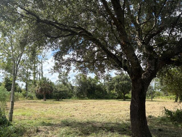 Welcome to Okeechobee and a fantastic opportunity to own your piece of paradise! This cleared lot is the ideal setting for your winter retreat, full time residence, or investment property. Enjoy the convenience of being close to Lake Okeechobee, renowned for its world-class fishing, boating, and outdoor recreation. Shopping, dining, and everyday essentials are just minutes away, while the peaceful atmosphere lets you relax and unwind. This gated community has so much to offer, private airport, guest cabins, RV parking, skeet, trap, rifle and pistol range, heated pool, gym, clubhouse, restaurant, tennis and pickleball courts, horse stables and riding arena with miles of riding trails.