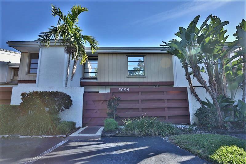 Beautifully updated 2-story townhome featuring 3 bedrooms and 2.5 bathrooms, with all bedrooms conveniently located on the second floor. Freshly painted throughout, this home offers a bright and welcoming interior.  The updated kitchen features granite countertops, stainless steel appliances, and opens to the dining area, where you can enjoy peaceful lake views. The first floor is finished with tile flooring, while all bedrooms have attractive wood laminate floors. The bathrooms have also been tastefully updated.  Enjoy outdoor living with a private front courtyard and a screened-in back patio overlooking the lake—perfect for relaxing or entertaining.  Conveniently located close to major highways, shopping, synagogues, and TY Park, this home offers both comfort and an excellent location.