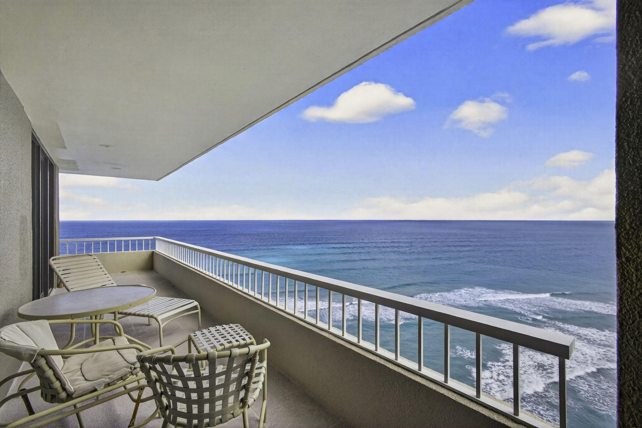 WIDE SANDY BEACH ideally located adjacent to John D. MacArthur State Park, featuring a very well-maintained community with a clubhouse, pool, and fitness center. This COVETED A-STACK offers INCREDIBLE, EXPANSIVE OCEAN AND INTRACOASTAL VIEWS, creating a rare opportunity to enjoy sweeping sightlines, privacy, and true coastal living in one of Singer Island's most desirable settings.