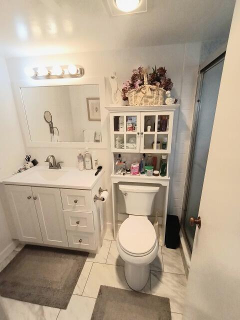 RARELY AVAILABLE CORNER unit with extra windows, bright and private!! Sleek with new appliances and eat in kitchen. Large 2 bedrooms & 2 full bathrooms with bathtub & shower. WASHER & DRYER IN UNIT (only allowed on the first floor). Screened private patio steps away from the lake, heated pool and clubhouse with internet, full kitchen & lots of activities, garden space outside back patio for plants. Assigned parking right outside your door. Shopping, walking trails, bike trails, one mile from the marina and beach. NEW AC, KITCHEN & APPLIANCES, BATHROOM VANITIES. Shutters, windows, front door and sliding doors are hurricane proof. Additional storage available. Walking to Casino, Shopping, Restaurants and Cafes. East of US1, FLL and Port  40-year done, Painted & Roof Done 2026. One person 55+
