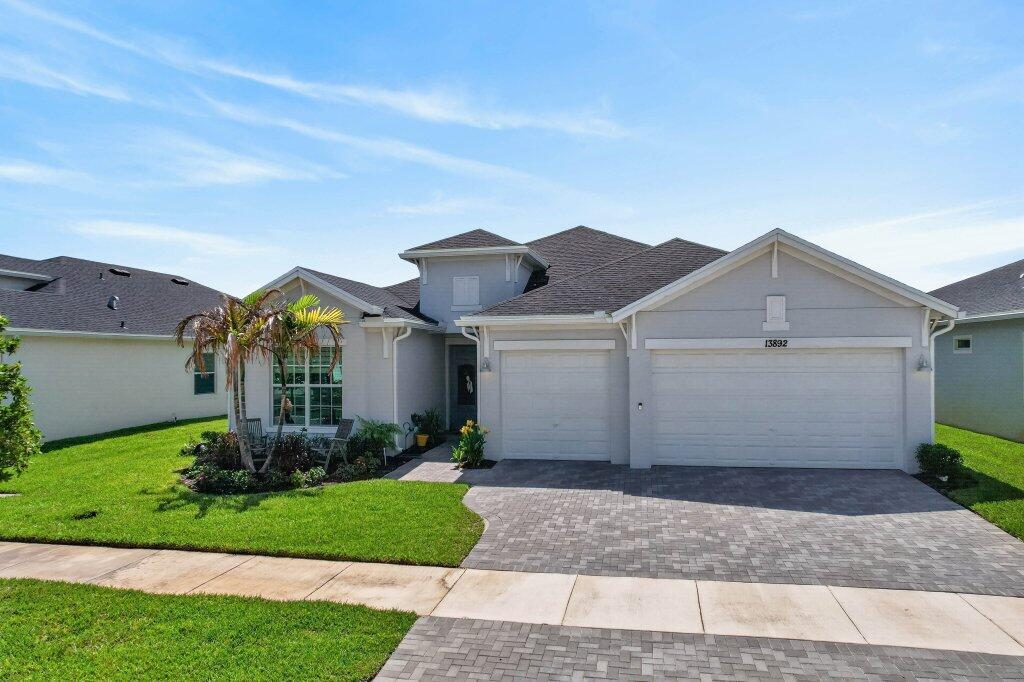 Discover the lakefront lifestyle you've been dreaming of in Veranda Preserve, one of Port St. Lucie's most sought-after gated 55+ communities. This beautifully 2024 Summerville floor plan welcomes you with soaring ceilings, crown molding, and breathtaking lake views from the moment you walk through the stunning double-glass entry door. Three bedrooms, three full baths, a versatile den & a 3-car garage offer space for everything you love. The chef's kitchen shines with quartz countertops & stainless appliances. Impact windows, covered patio & world-class amenities such as pool, pickleball, tennis & clubhouse complete the picture. All of this nestled in Port St. Lucie, Florida's fastest-growing city, minutes from pristine beaches, Cleveland Clinic, Tradition's dining & shopping. Come see it!
