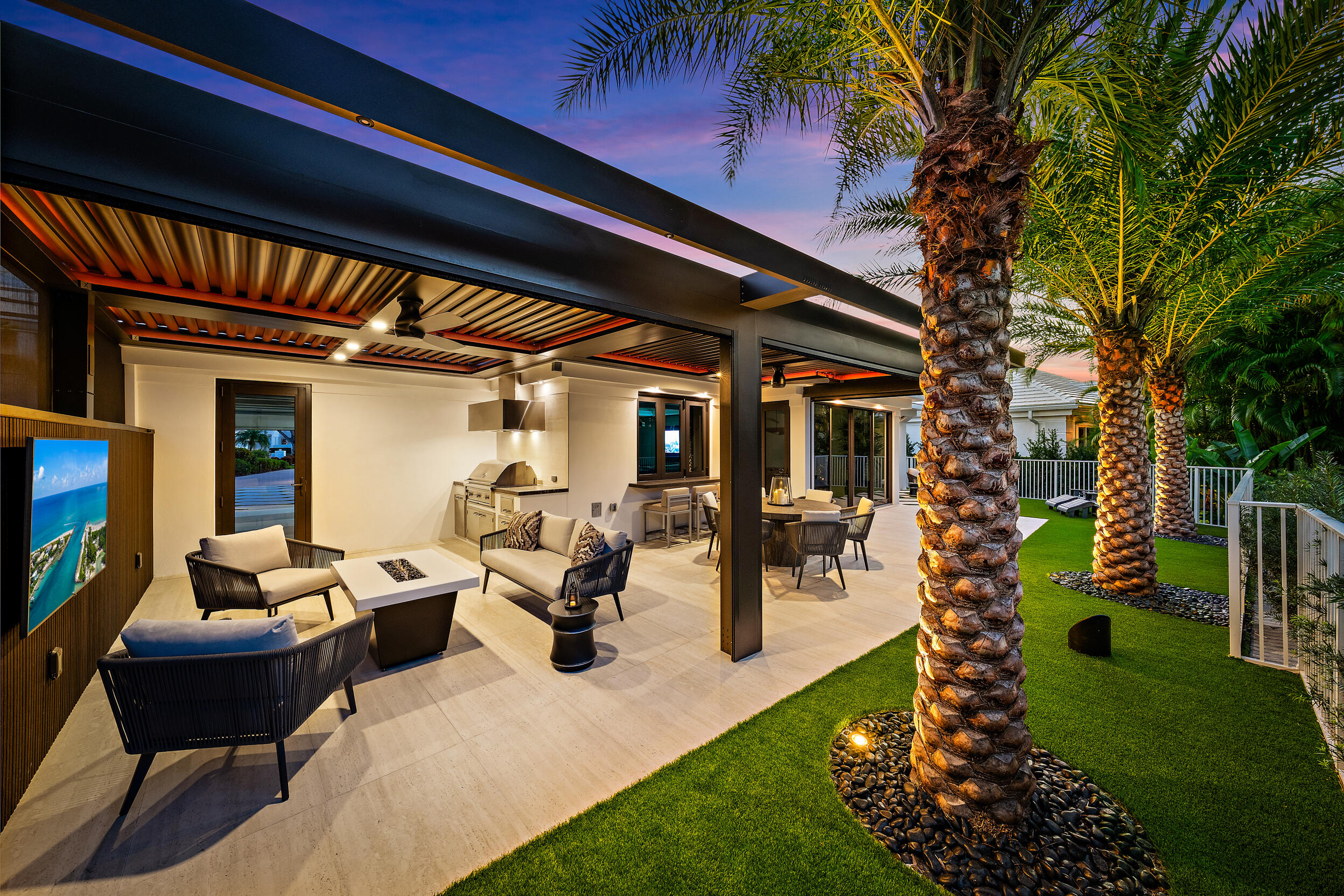 Fully renovated and thoughtfully re-designed, this exceptional cottage offers a rare blend of sophisticated design and effortless indoor-outdoor living. High-end finishes, sleek clean lines, and a bright open floor plan create a modern yet inviting atmosphere throughout the home.  Expansive impact glass windows and doors fill the interiors with natural light while seamlessly connecting the living spaces to the outdoors. The redesigned layout maximizes flow and functionality—creating a one-of-a-kind cottage floor plan unlike any other in the community.  Step outside to a backyard that rivals homes twice its size. Designed for both relaxation and entertaining, the outdoor space features multiple lounge areas, an impressive summer kitchen, and thoughtfully designed entertainment spaces.  A striking louvered aluminum pergola provides adjustable shade and architectural style, creating the perfect setting for gatherings day or night.  Ideally located just moments from the Club, Tennis, Spa, and Marina, this truly special residence offers the perfect combination of luxury, comfort, and convenience in a beautifully reimagined cottage setting.
