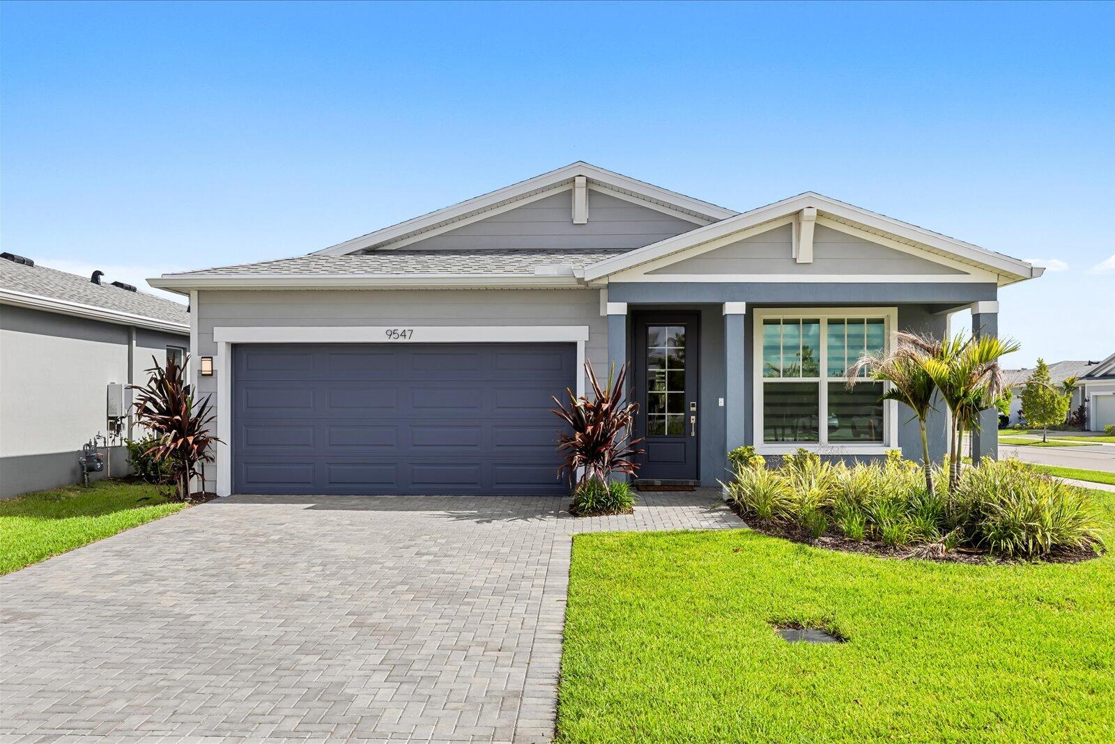IMPACT WINDOWS! NATURAL GAS! LOWER HOA! PRIME LOCATION! Welcome to this like-new 2025-built 3-bedroom, 2.5-bath home with a versatile flex room, located on a desirable corner lot in Kenley, one of the newest gated communities within the award-winning master-planned community of Tradition. This move-in-ready home features impact windows, a private fenced backyard, and modern finishes throughout. The low HOA of $437 a month includes cable, internet, and security, while residents enjoy access to a community pool and fitness center. With construction in the neighborhood nearly complete, you can enjoy the benefits of a newer community without the inconvenience of ongoing construction.