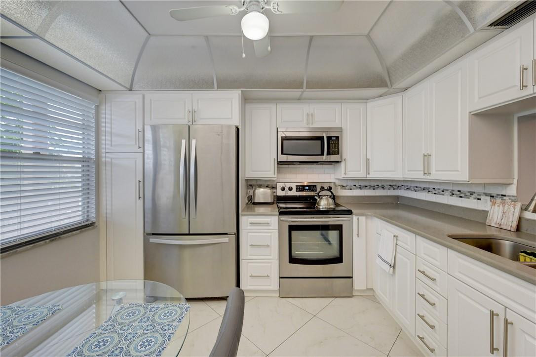 BEAUTIFUL 2 BEDROOM/2BATH WITH PRIME LOCATION AND VIEW. PNORAMIC GOLF/LAKE. UPDATED KITCHEN + APPLIANCES. CERAMIC FLOORS THROUGH-OUT. HIGH IMPACT WINDOWS IN THE BALCONY. NICE BATHROOMS. A MUST SEE!. ASSOC REQUIRES 20% DOWN & 1 OCCUP 55+ VACANT/CLICK SHOWING ASSIST