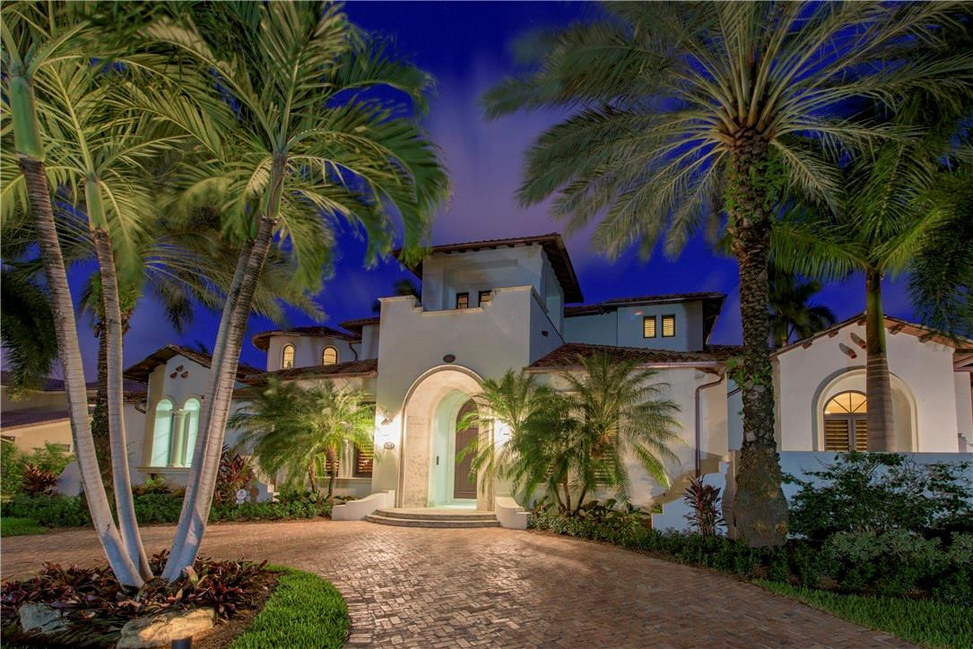 One of Las Olas' finest homes.  Yacht owner's dream, 125' of coveted waterfront can dock up to 105' yacht. Wide, deep waterway and proximity to the point allow easy navigation. 1st floor master and  1st floor VIP Suite. 3 large bedroom suites upstairs, media room, library, fitness/theater room & expandable 3-bay garage. Two family rooms, wine room and a chef's kitchen with gas cooking. Surrounded by high value real estate, this professionally decorated home is sophisticated and bright. Turn-key optional.