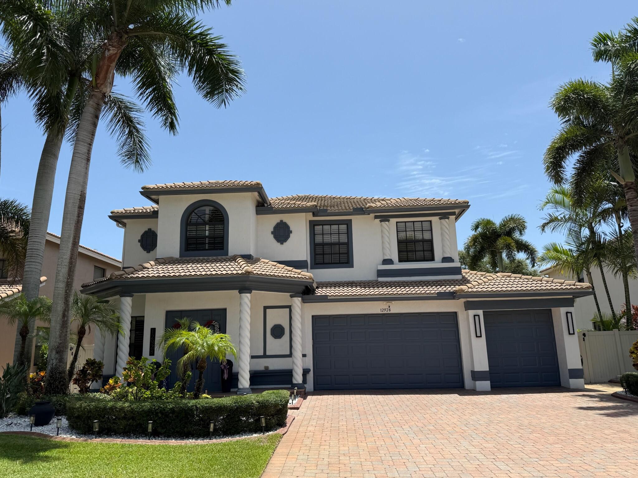 Only 39 homes make up the Montreux community, making opportunities to own here rare. This beautifully maintained pool home offers 4 bedrooms plus a private executive office/flex room, 3 full baths, approximately 3,348 square feet, and a 3-car garage with a new epoxy floor. Freshly painted inside and out with a new A/C (2024), tile floors downstairs, wood floors upstairs, plantation shutters, an updated kitchen with newer appliances, and a custom coffee bar with a wine fridge. Step outside to a private backyard retreat with a custom pool, spa, rock waterfall, outdoor kitchen, and fully fenced yard. Ideally located near the Boynton Beach and Delray Beach line, you're minutes from Atlantic Avenue, beaches, golf, shopping, dining, and major highways. Homes like this rarely become available.