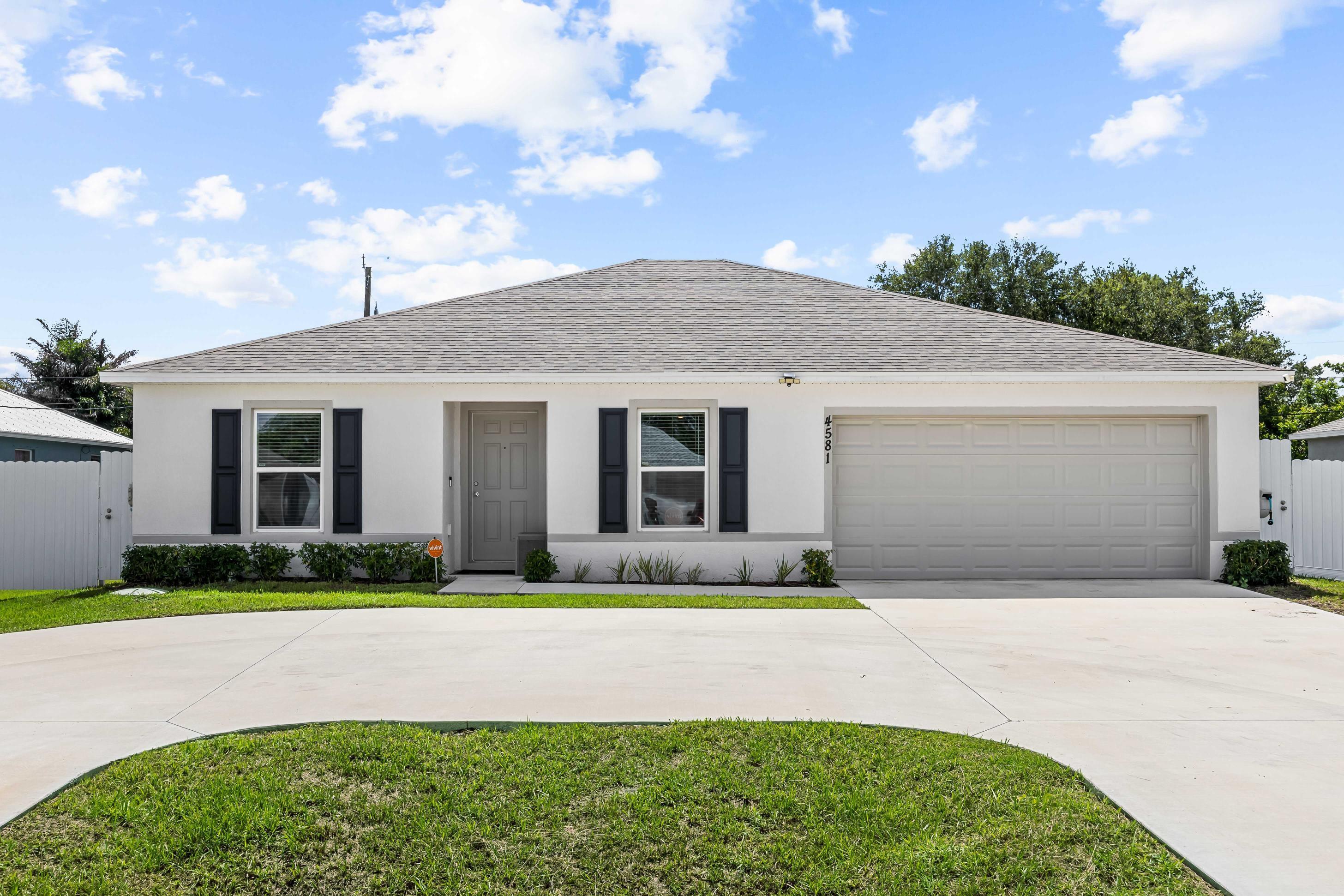 Beautifully maintained 2024 CBS home offering 3 bedrooms and 2 bathrooms in a desirable Port St. Lucie location. This newer home features a bright and functional floor plan, a 2-car garage, a fully fenced backyard, and a circular driveway providing added convenience and extra parking. Ideally located with easy access to I-95 and the Florida Turnpike, and just minutes from Tradition, shopping, dining, parks, schools, and everyday conveniences. A wonderful opportunity to own a newer home in one of Port St. Lucie's fastest-growing areas.