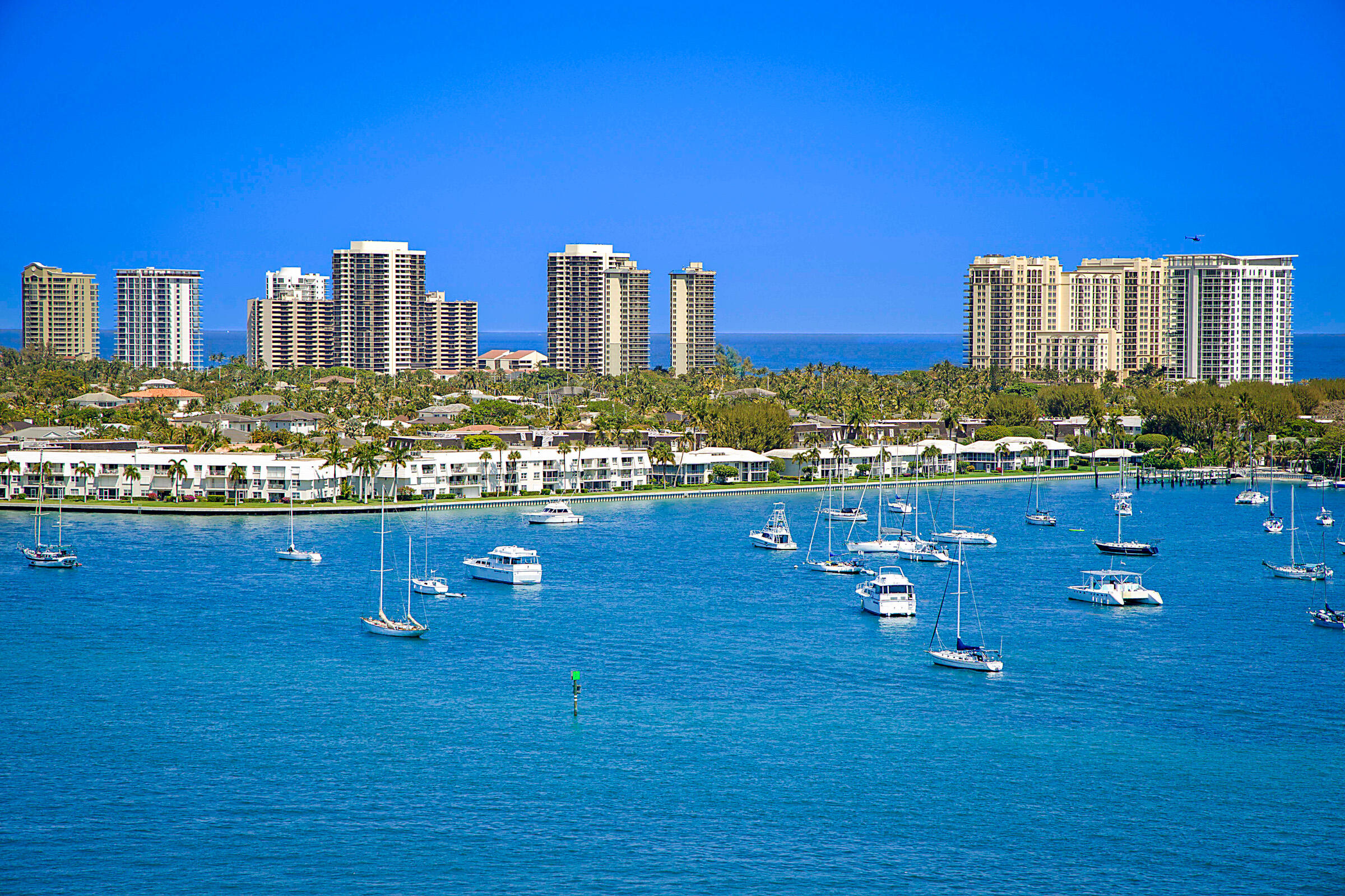 Have you ever envisioned owning a residence with multimillion-dollar, unobstructed waterfront views—without the multimillion-dollar price tag? This is your rare opportunity.Perched on the highly desirable southeast corner of the 14th floor, this exceptional "16 stack" residence at Marina Grande Condominiums offers what is arguably one of the most breathtaking vantage points in all of Palm Beach County. From the moment you enter, you are captivated by sweeping 180-degree panoramic views—stretching south across the Intracoastal from Palm Beach to North Juno Beach, while simultaneously capturing the shimmering turquoise waters of the Atlantic Ocean to the east. Views of this caliber are truly irreplaceable—and impossible to recreate.  • Approximately 1,800 sq ft of interior living space  • Expansive 154 sq ft private balcony ideal for sunrise and evening entertaining  • 3 Bedrooms | 3 Full Bathrooms  • Rare end-unit positioning with additional south-facing windows for enhanced natural light  • Motorized window treatments in the living area  • Updated kitchen featuring:  o New stainless steel appliances  o Double ovens + warming drawer  o Elegant granite countertops  • Full-size new washer & dryer in dedicated laundry room   Residents of Marina Grande enjoy a private, resort-inspired lifestyle with world-class amenities, including: • Newly renovated waterfront pool deck  • Tennis, pickleball & bocce courts  • Expansive state-of-the-art fitness center  • Sauna & steam rooms  • Elegant billiards & card lounges  • 24-hour concierge & security  • Valet services  For boating enthusiasts, a full-service marina just steps away provides effortless access to the Intracoastal and direct ocean entry within minutes—an unparalleled advantage for the South Florida lifestyle.  Ideally situated in the heart of the Palm Beach waterfront corridor: • 5 minutes to the pristine beaches of Singer Island  • Near Phil Foster Park — internationally known for snorkeling and diving  • 15 minutes to the Port of Palm Beach  • 20 minutes to Palm Beach International Airport  • Minutes from the world-renowned luxury of Palm Beach and West Palm Beach, offering fine dining, designer shopping, golf, and cultural attractions  This residence represents a hidden luxury gem under $1 million—an extraordinary value for a corner waterfront condo with irreplaceable views, resort amenities, and premier location.