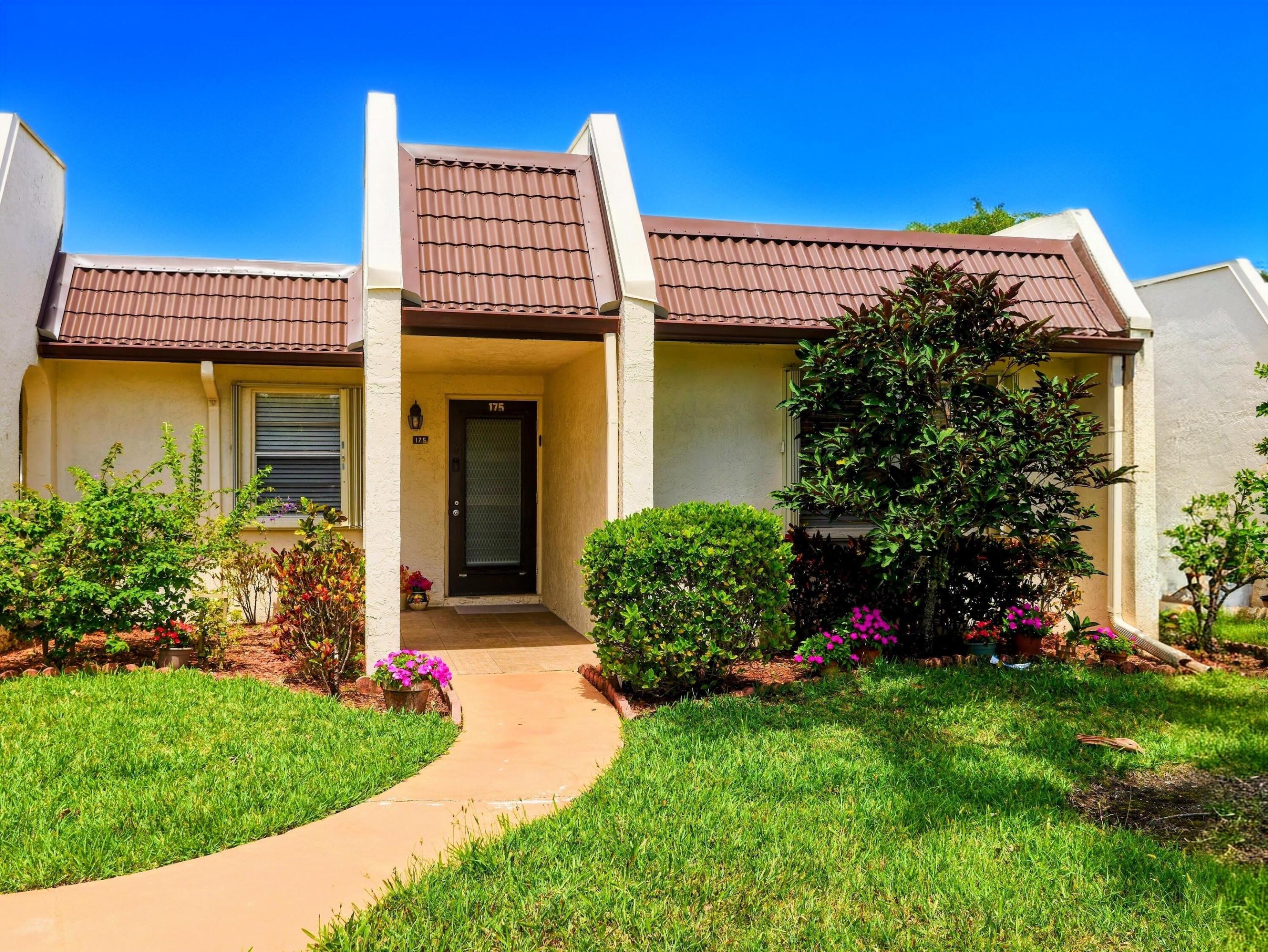 Welcome to this charming 2-bedroom, 2-bathroom villa nestled in the Golden Lakes Village Condo community of West Palm Beach, Florida. Spanning 1,009 square feet of above-grade living space, this single-story residence offers comfortable and efficient design. As a waterfront property, this villa presents a distinctive opportunity to enjoy scenic water access in a well-established community. The thoughtful layout provides ample space for everyday living while maintaining an intimate, manageable footprint. Located in the desirable Golden Lakes Village Condo M subdivision, this villa represents an excellent opportunity for those seeking waterfront living in West Palm Beach. If you are still mowing your own lawn and fixing your own roof, you are doing Florida wrong. Welcome to 175 Lake Susan Lane, your new address for unapologetic, maintenance-free resort living inside the highly desirable 55+ Golden Lakes Village community.  Why settle for average when you can have resort-style amenities right in your backyard?  The Vibe: Bright, open, and effortless. Enjoy a turnkey easy-living space featuring an open living and dining area, perfectly complemented by a bright white kitchen with ample storage.  The Retreat: A primary bedroom suite that actually feels like a suite. The attached ensuite bathroom offers a highly functional layout, complete with a pristine walk-in shower and an expansive vanity.  An additional Space: Need a dedicated workspace or a spot for your exercise equipment? The enclosed sunroom offers a versatile, climate-controlled space bathed in natural light with peaceful views.  The Resort Lifestyle (Golden Lakes Village) When you drive past the grand community entrance, you are entering a fully loaded oasis. The amenities here provide a true country club feel without the massive fees:  * A massive, active clubhouse featuring a comfortable social lounge, community meeting rooms, library, and billiards room. * An Olympic-size resort-style swimming pool, plus five additional pool areas scattered throughout the community. * Pristine pickleball and tennis courts for staying active and social. * A well-equipped, on-site fitness center.  The Neighborhood & Attractions You are perfectly positioned in West Palm Beach, just minutes away from practically everything that matters:  * Shopping & Dining: A quick drive to the Mall at Wellington Green, the Palm Beach Outlets, and numerous grocery options including Publix, Whole Foods, and ALDI. * Nature & Recreation: Enjoy immediate access to Okeeheelee Park, Mounts Botanical Garden, and the Wellington Environmental Preserve. * Entertainment & Travel: The Kravis Center, premier local golf courses, and Downtown West Palm Beach are all within easy reach. The beautiful Atlantic Ocean beaches are just 15 minutes away, and Palm Beach International Airport is conveniently nearby for travel.  In this market, a meticulously maintained turnkey property with this level of amenities does not last. Schedule your private showing and secure your slice of maintenance-free Florida living today.