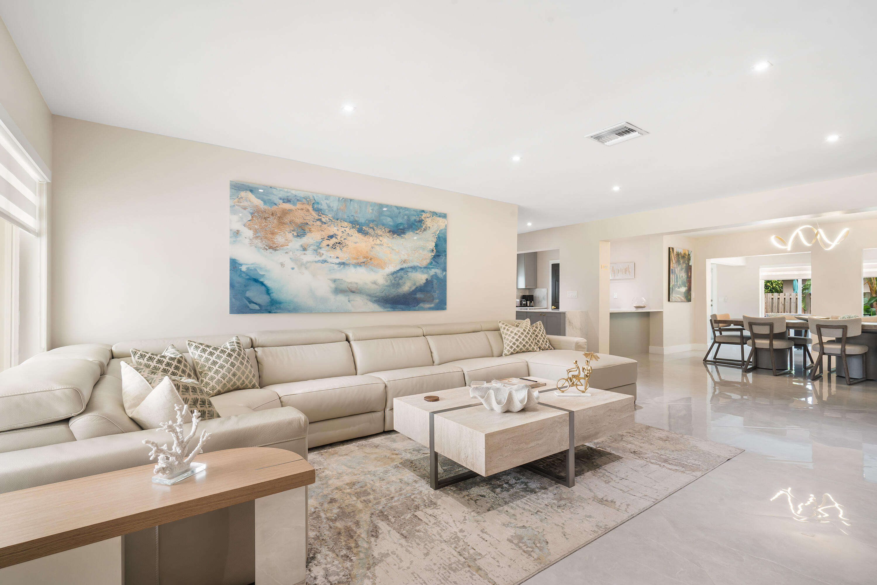 Beautifully renovated pool home in Floranada Ridge - one of the largest models in the community. This 5 bedroom, 3.5-bath residence offers 2,672 square feet of thoughtfully designed living space on an oversized 9,000 sq ft lot. Step inside to bright, open interiors with elevated finishes throughout, including oversized ceramic tile flooring, expansive living and dining areas, and abundant natural light. The modern kitchen features quartzite countertops, new appliances, and a seamless flow into the main living space. This home features 2 ensuite bedrooms, offering excellent privacy for guests or multigenerational living. Highlights include spa-inspired bathrooms with integrated Bluetooth speakers, electric blinds, impact windows, 2 ACs and new roof.  A rare opportunity to own one of Oakland Park's top 10% performing short-term rentals, this fully furnished and professionally designed home is a turnkey, high-yield STR built for large groups and repeat stays. Enjoy a heated pool and spacious patio perfect for entertaining. Minutes to the beach, dining, and entertainment, this is a rare chance to acquire a proven, top-performing STR offered fully turnkey.