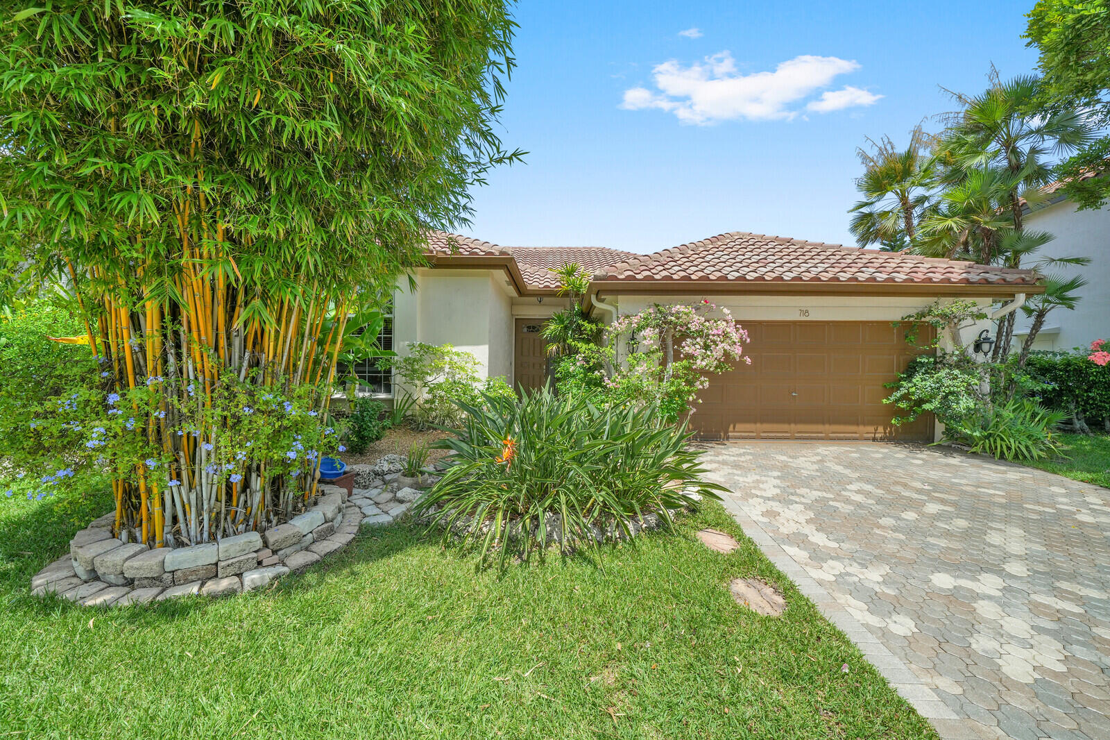 Discover this beautifully maintained 3 bedroom, 2.5 bathroom single-family home in the highly desirable Silver Lakes community in Pembroke Pines. Perfectly positioned on a tranquil lakefront lot, this home offers spacious living areas and timeless finishes.  The thoughtfully designed kitchen features Jurassic Green granite countertops, solid maple wood cabinetry with a warm wheat bronze finish, a cozy breakfast nook, and convenient counter seating, ideal for both everyday living and entertaining. The home offers both a formal living room and a comfortable family room, providing flexible spaces for gathering and relaxation.  Elegant details can be found throughout, including crown molding, 6.5-inch baseboards, Spanish tile flooring in the main living areas, and wood-look porcelain tile in all bedrooms. The bathrooms are beautifully appointed with granite countertops and solid wood cabinetry.  Step outside to a screened-in patio overlooking a peaceful lake, with a fenced backyard and grassy area perfect for outdoor enjoyment. Additional highlights include a two-car garage, accordion shutters and impact glass for added storm protection, and a durable 10 year old concrete tile roof.  Enjoy the best of South Florida living in this move-in-ready home with picturesque water views in one of Silver Lakes' most sought-after neighborhoods with access to community amenities, including a pool, clubhouse, and a lakeside volleyball court.