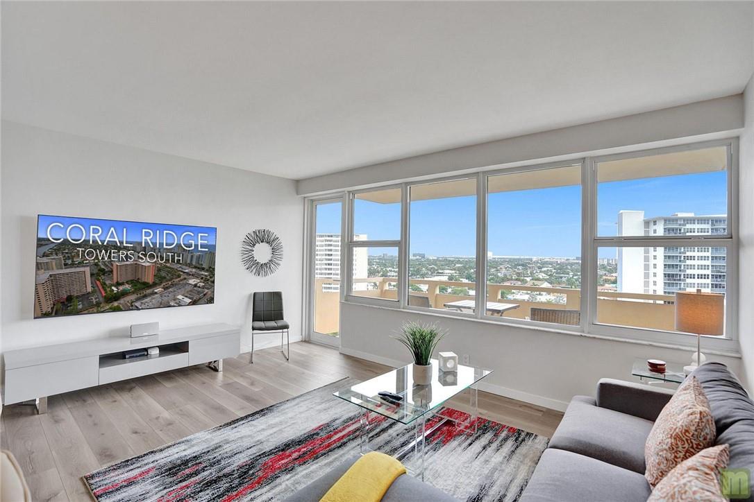 Enjoy spectacular East-West views to the ocean and intracoastal on your private balcony from this stunning North-facing 12th floor unit.  This gorgeous, completely remodeled home features a brand-new, open kitchen with breakfast bar, new stainless steel appliances, bright white shaker cabinets, quartz countertops, new bathrooms, new flooring, new paint, new light fixtures, custom bar, over-sized primary bedroom with large walk-in and secondary closets, high-impact windows and balcony door. Incredible location, walking distance to the beach, shopping, restaurants and everything the Galt Mile has to offer. Building also features air conditioned hallways, fire sprinklers, heated pool, gym, library, on-site management and lots of guest parking. No pets, no leasing. 55+ co-op