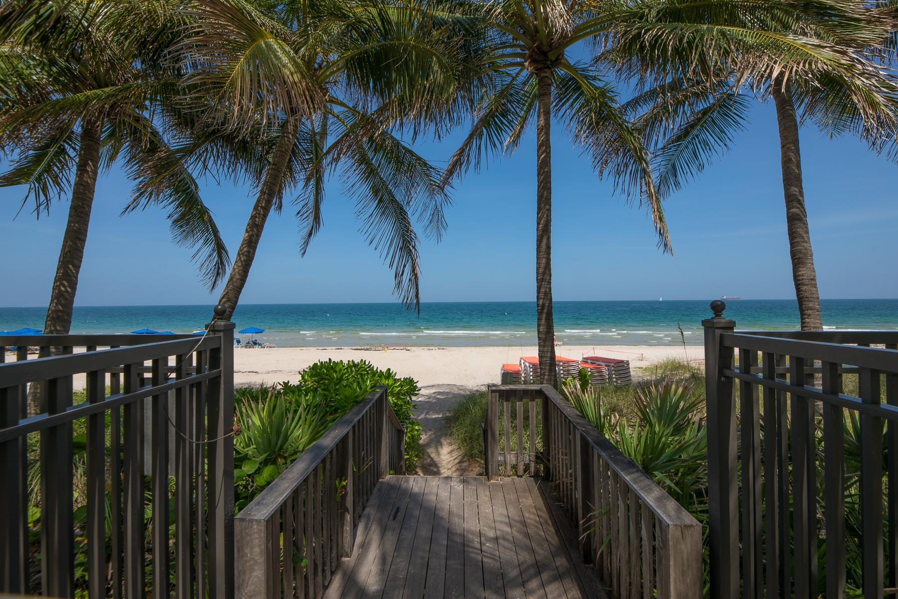 Stunning 3-bedroom, 3-bath beachfront condo completely updated with designer finishes throughout. Enjoy breathtaking sunrises and sunsets, tranquil park views and city skyline vistas from the wraparound balcony.  This beautifully renovated residence features a brand-new kitchen, premium countertops, and updated appliances, along with remodeled bathrooms offering luxury and comfort. Additional upgrades include a new water heater and new washer & dryer.  Spacious, bright, and move-in ready, this exceptional condo offers the perfect blend of coastal elegance and contemporary living in a prime beachfront location.  Amenities include:  2 Pools, 2 Hot Tubs, Fitness room, BBQ. Includes Cable & Hi-Speed internet, 24/7 Front Desk/Valet, fully funded, and supported by an updated SIRS report. Furniture negotiable