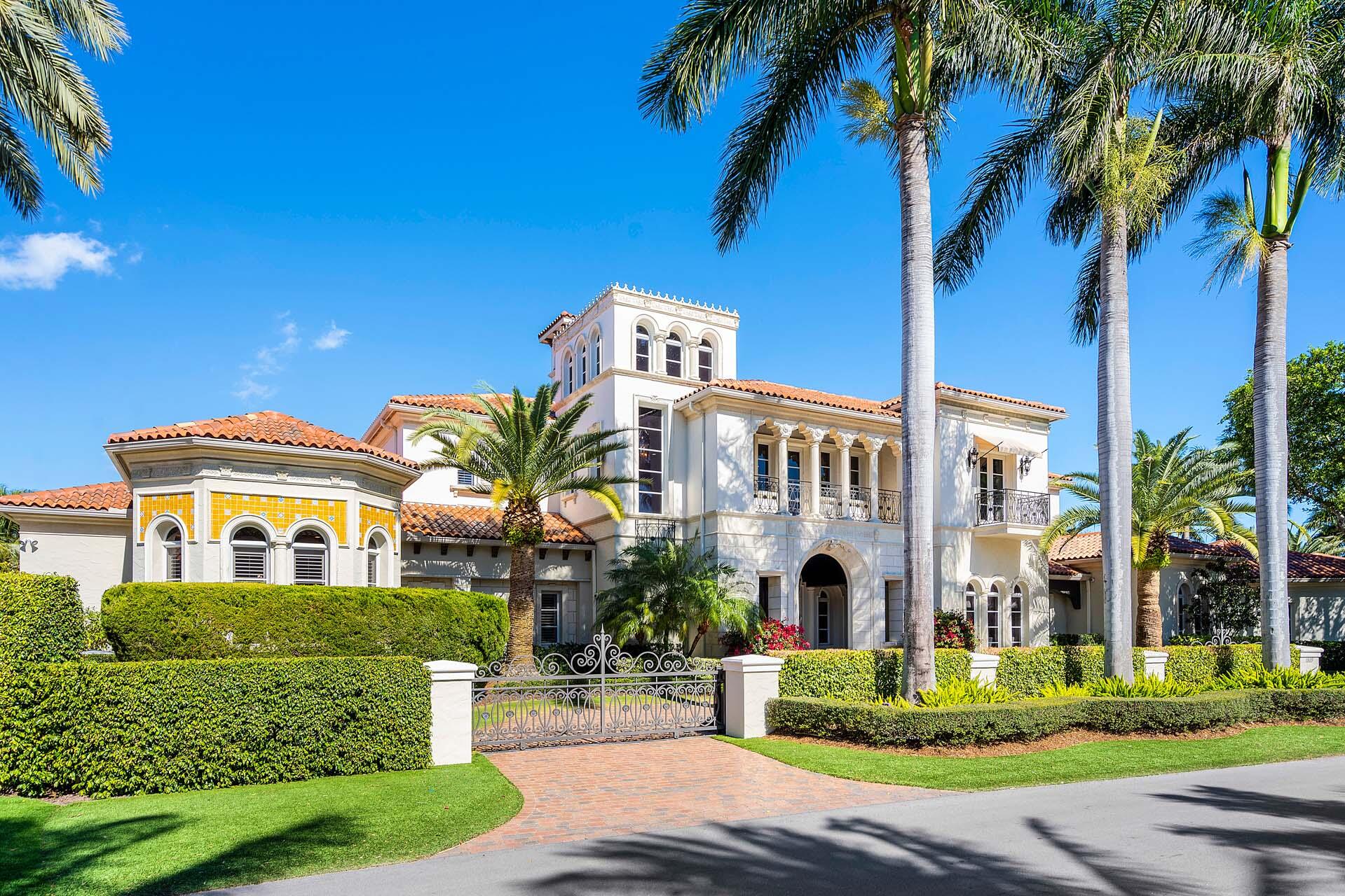 An extraordinary opportunity to own nearly an acre of prime golf course frontage in RPYCC, boasting an impressive 189 feet along the 9th and 18th fairways. 1869 Sabal Palm Drive is a distinguished five-bedroom estate designed for those who appreciate grand-scale living and resort-style amenities. A private, gated motor court welcomes you to this expansive residence, where refined interiors and exceptional outdoor spaces create an unparalleled lifestyle. Indulge in world-class amenities, including a heated resort-style pool and spa, a private sports court, a four-hole putting green, and a fire pit lounge all surrounded by lush, mature landscaping for ultimate seclusion. Inside, marble and rich wood flooring set the stage for sophisticated living. A grand club room with a quartzite bar and private study, a temperature-controlled wine cellar with custom cedar racks, and a lofted gym/bonus room cater to relaxation and entertainment. The first-floor primary suite is a serene retreat with a sitting area, fireplace, His & Her spa-inspired baths, and boutique-style dressing rooms. With four garages, two dedicated golf cart bays, and a location that captures the essence of elite golf course living, this estate presents an unrivaled offering in one of the most coveted enclaves in East Boca Raton.