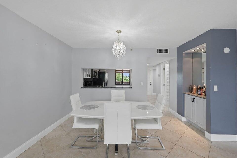 Welcome to Cypress Bend! This beautifully renovated condo combines modern upgrades with an unbeatable South Florida lifestyle. Featuring an updated kitchen with granite counter tops and stainless steel appliances, spa-inspired bathrooms, spacious living areas, and move-in-ready convenience. Enjoy a prime Pompano Beach location just minutes from shopping, dining, entertainment, and approximately 23 minutes from the renowned Pompano Beach Municipal Pier. Whether you're seeking a year-round residence, seasonal retreat, or investment opportunity, this exceptional property delivers comfort, style, and coastal charm.