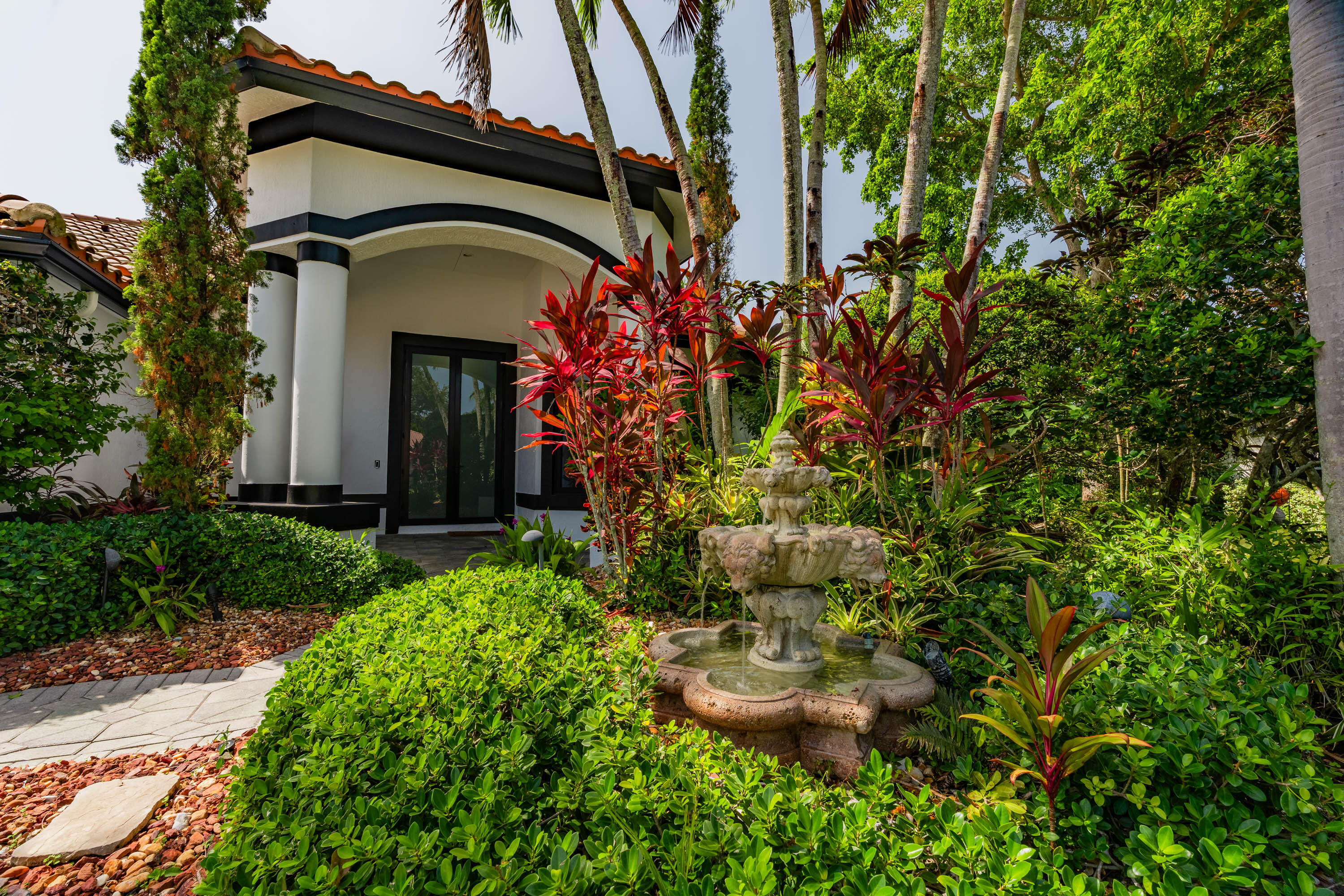 Welcome to this fully renovated lakefront home tucked away on a quiet cul-de-sac in the highly sought-after gated community of Ternbridge. Situated on an oversized reverse pie-shaped lot, this exceptional five-bedroom residence offers over 3,100 square feet under air, blending timeless style with modern luxury in one of Parkland's most desirable neighborhoods.  The extensively renovated interior features a stunning chef's kitchen, beautifully updated bathrooms, custom-built closets, new appliances, and a desirable split floor plan designed for both everyday living and entertaining, making this home truly move-in ready.  Designed to embrace the South Florida lifestyle, the backyard is a private retreat featuring a renovated pool and deck (2024), new pool heater and saltwater conversion (2025), expansive lake views, and newly installed turf. The oversized reverse pie-shaped lot creates an exceptional outdoor setting with two additional outdoor living areas beyond the pool and deck, providing abundant space for entertaining, recreation, and enjoying the tranquil waterfront setting.  Recent major improvements include impact windows and doors (2025), fresh exterior paint and a newly rescreened pool enclosure (2026), a new Lennox A/C system (2026), and a climate-controlled garage with a mini-split A/C (2026), offering both style and peace of mind.  Ideally located near parks, shopping, dining, major roadways, and highly regarded public schools, this move-in-ready home offers an exceptional blend of luxury, convenience, and the best of South Florida living.