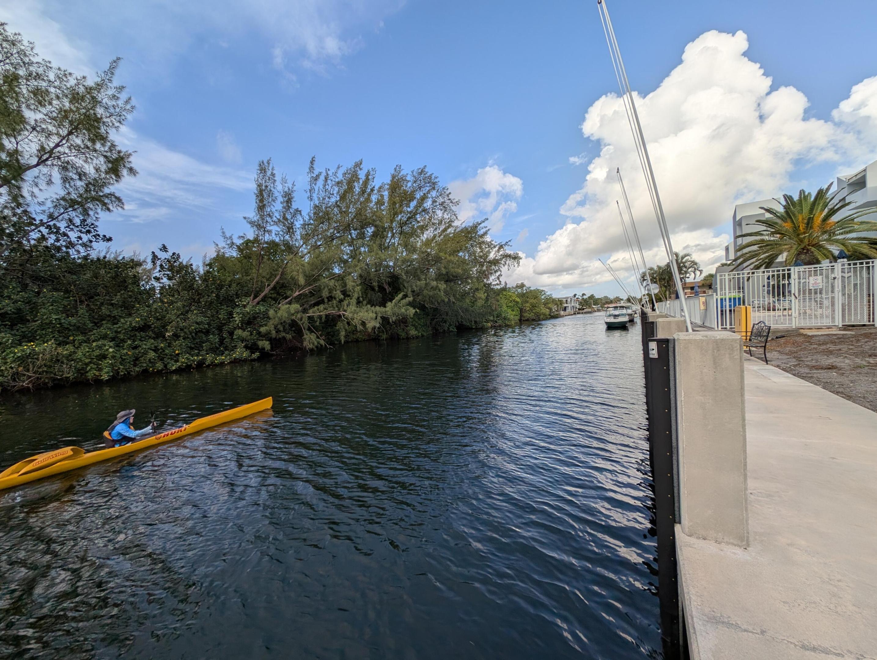 Bring your boat and keep it right outside your door!  No fixed bridges and and you are fishing in the Atlantic in 15 minutes!    Unit is on the first floor with no elevators to ride or stairs to climb in order to get home.  Parking spot is right outside the front door with guest parking also available.  Perfect for someone looking for the Florida lifestyle - life in flipflops near the beach and a boat ready for action just outside your back door!  Unit itself is a 2 BR/2 Bath with recently renovated kitchen and practical design.   New Stainless appliances .  Newer AC.  Great for snowbirds or someone who wants to live the Salt Life!