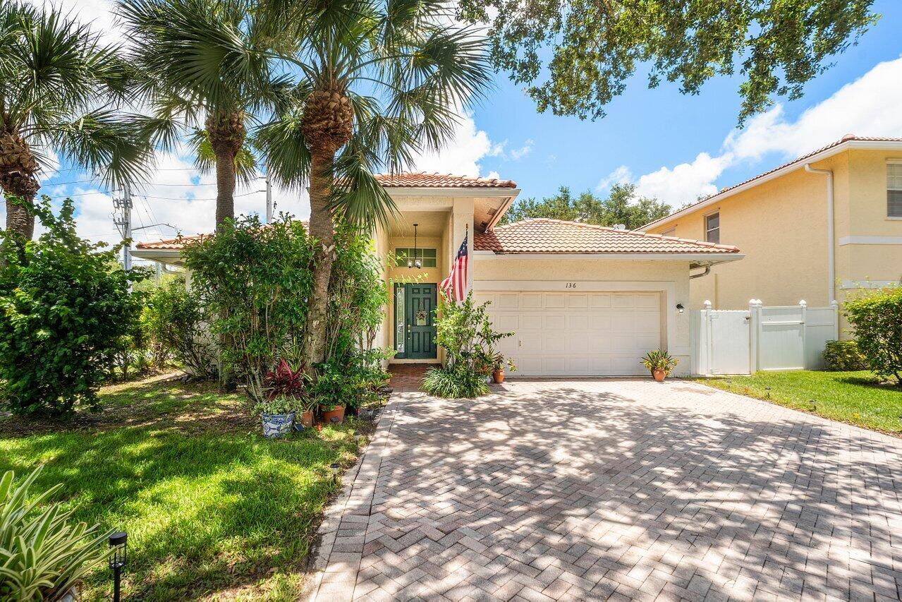 Within the gated Hidden Hollow community, this beautifully maintained home offers a rare combination of privacy, convenience, and charm. Enjoy low HOA dues, a peaceful neighborhood setting, a boutique community of only 51 homes, providing a quiet, welcoming atmosphere in the heart of PBG. Impact windows, renovated kitchen, you have to come see this for yourself, schedule a showing today!