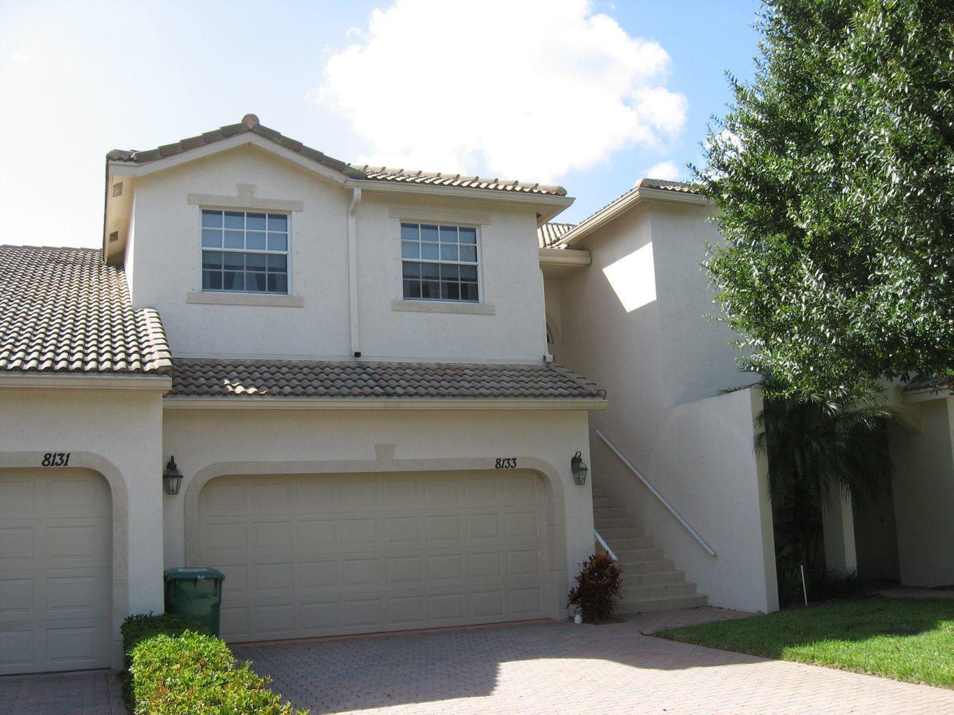 Beautifully maintained 3-bedroom, 2.5-bath lakefront townhouse located in the highly sought-after Castle Pines community within PGA Village. This spacious home offers an open floor plan with a well-appointed kitchen, dining area, and living room overlooking the tranquil lake. The first-floor bedroom enjoys peaceful water views, while upstairs you'll find two additional bedrooms with access to a private balcony—the perfect place to relax and take in the scenic surroundings. A spacious two-car garage provides plenty of room for parking and storage. Enjoy resort-style living just steps from the community pool & playground, with access to six lighted Har-Tru tennis courts, pickleball and basketball courts, picnic areas,  beautifully maintained grounds. Ideally located in the heart of St. Lucie Medical facilities, Clover Park, Mets Spring Training, I-95, and Florida's beautiful Treasure Coast beaches. Experience the perfect combination of comfort, convenience, and the exceptional PGA Village lifestyle.