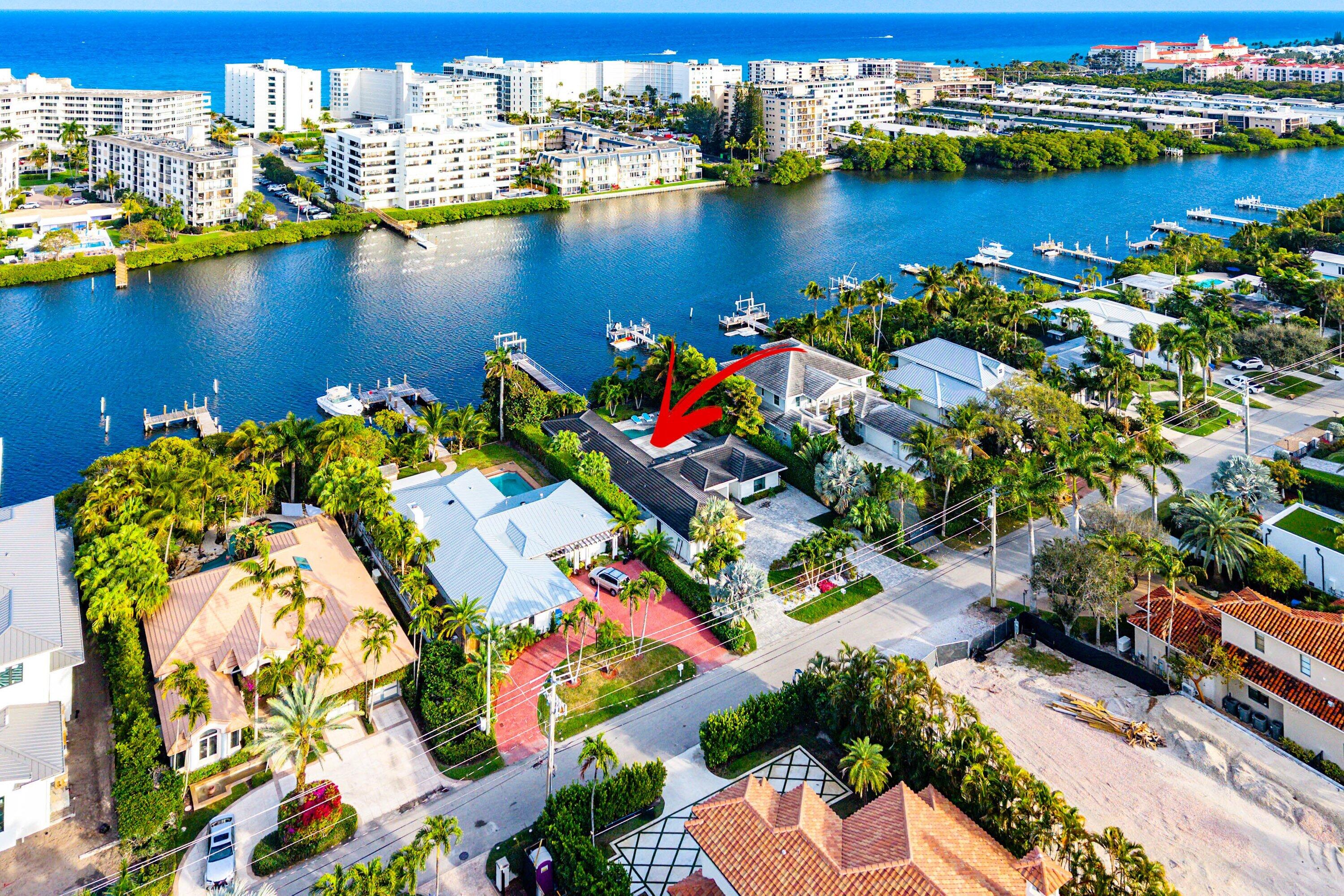 Waterfront luxury meets modern island living on exclusive Hypoluxo Island -- one of South Florida's most coveted and fast-appreciating coastal enclaves.  Ideally positioned between Palm Beach and Manalapan, and minutes to the beach along scenic A1A, this private island community of just 315 single-family homes offers unmatched privacy, prestige, and convenience. This fully renovated 4-bedroom, 2.5-bath waterfront residence spans 2,726 SF and is designed for effortless one-story living. Vaulted ceilings, impact windows, and upgraded 4x4 porcelain floors complement expansive open living spaces filled with natural light and stunning water views. The redesigned chef's kitchen features Miele appliances, a gas stove, and an integrated espresso machine. The primary suite showcases spa-inspired finishes, custom closets, and tranquil pool views.

Outdoor living is exceptional with a heated saltwater pool, sauna, cold plunge, and expansive entertaining deck surrounded by lush landscaping for total privacy. A new private dock with a 16,000-lb boat lift and jet ski storage offers quick, direct access to the Boynton Beach Inlet and the Atlantic Ocean.

Additional highlights include a whole-home generator, 3-zone A/C, water filtration system, and custom furnishings.

A rare opportunity to own prime waterfront property in one of South Florida's most sought-after island communities -- where lifestyle, location, and long-term value align.