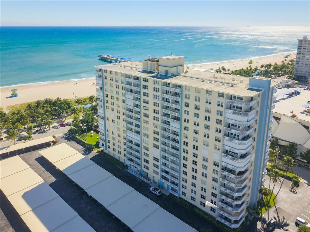 Seeking new owner for immaculate, beautifully decorated, ready to move in, corner unit with wrap-around balcony, high-end furniture and window treatments.  Totally remodeled with Italian, imported large tile, granite kitchen tops, SS appliances, walk-in closets, pantry, extra storage downstairs.  Close to pier, restaurants, shopping, buses, new development on Atlantic and new downtown Atlantic area. Lower maintenance than most buildings with big reserves, and most amenities, like, community and exercise rooms, and men's and women's saunas and bath areas, heated pool, shuffleboard, etc.; covered parking, Great for vacationers, renters, family and friends. Grab a bike or take a walk and take off. A delightful unit to show.3D tour: https://nodalview.com/q36BSzLzigfUBD5uaa2vAZS5?viewer=mls