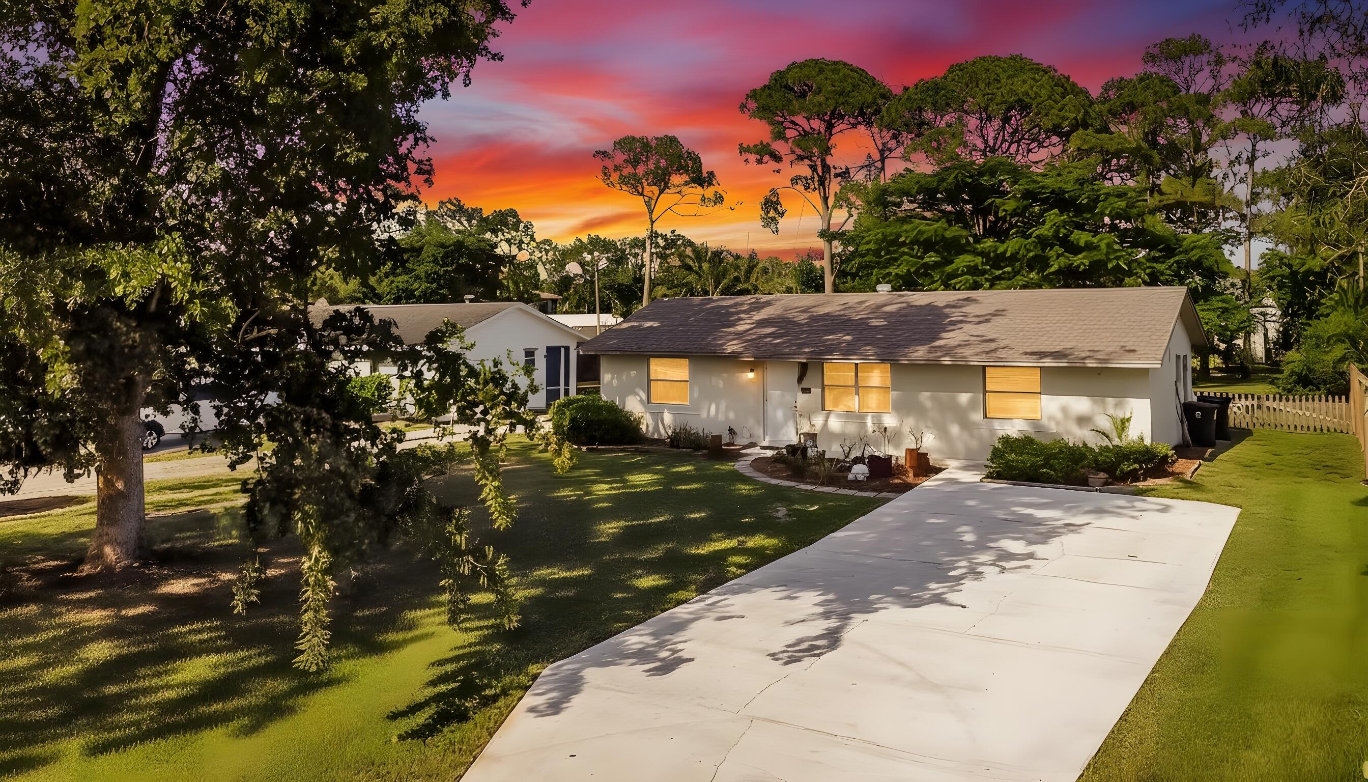 Rare opportunity to own a spacious 4-bedroom, 2-bath single-story home on an oversized .54-acre lot with NO HOA in the highly desirable Greenacres / Lake Worth area! Offering the perfect blend of privacy, functionality, and outdoor space, this property is ideal for homeowners seeking room to spread out without restrictive association rules. This thoughtfully designed split-bedroom floor plan offers maximum privacy, with a permitted 4th bedroom addition providing the flexibility for a guest suite, home office, playroom, or multigenerational living. The comfortable single-story layout features 1,646 square feet of living space with no stairs to navigate. The heart of the home includes a functional kitchen with a dedicated laundry room conveniently located just off the kitchen and a side entrance for easy access. Enjoy Florida living year-round in the expansive screened-in patio overlooking the massive backyard with endless possibilities to create your dream pool, garden, outdoor kitchen, or simply enjoy the open space. Additional highlights include a brand-new septic tank, two storage sheds for all your tools and equipment, ample parking, and plenty of room for boats, trailers, RVs, or recreational vehicles. Located in an established neighborhood close to shopping, dining, parks, schools, and major roadways, this is a rare chance to own a large piece of property with the freedom of NO HOA while remaining conveniently close to everything South Florida has to offer.