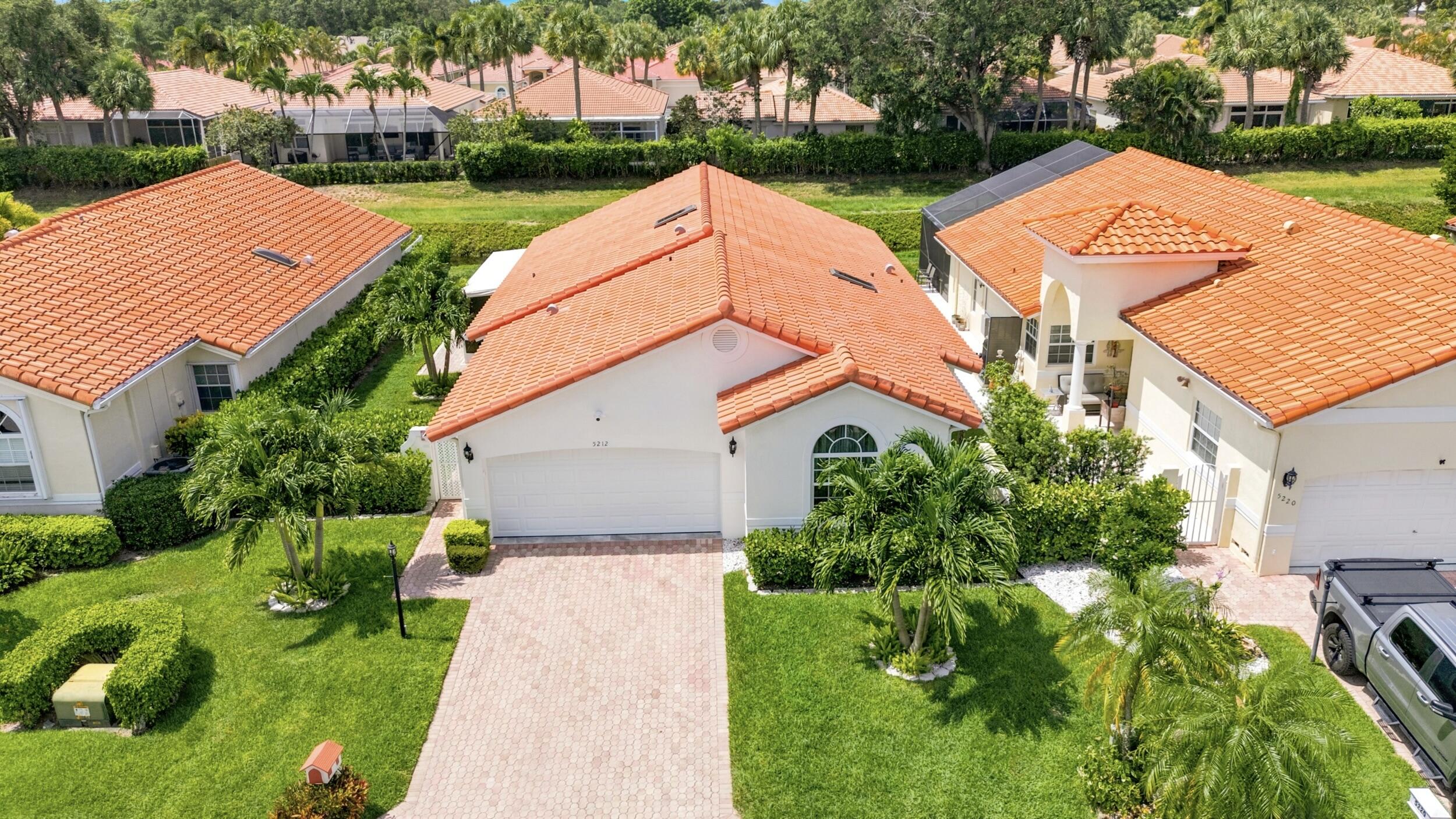 Welcome to this stunning, fully updated, turnkey 3-bedroom, 2-bath home where luxury meets peace of mind. Loaded with premium upgrades, this move-in ready home features FULL hurricane protection with all 2025 hurricane-impact windows, sliders, front door, flat impact skylights, and a hurricane-impact garage door. The meticulously redesigned interior showcases a gorgeous, spacious kitchen with quartz countertops, marble backsplash, and a large island perfect for entertaining. Spa-inspired bathrooms with floor-to-ceiling tile and luxurious finishes, custom built-in closets throughout offering exceptional storage, a tiled garage floor, and a tiled covered screened patio complete this beautifully finished home. Situated on a generously sized canal-front lot with plenty of room for a pool, the exterior features fresh paint, all-new lush landscaping, and an updated irrigation system. Smart home upgrades include a Google Nest exterior camera system with video doorbell, a smart thermostat, and a video-enabled, Amazon Key-compatible garage door opener. Additionally, A/C is 2022, and WH is 2023. Located in a gated all-ages community with a low HOA of just $377/month, covering landscaping, irrigation maintenance, clubhouse, fitness center, tennis courts, high-speed internet, cable TV, gated entry, and 24/7 community security cameras. Ideally located just minutes from the beach, shopping, dining, entertainment, and top-rated schools.