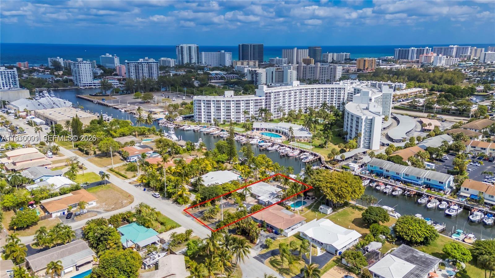 A rare trophy estate lot positioned at the mouth of the Hillsboro Inlet, offering an exceptional opportunity to build a custom waterfront residence. Situated on a deep-water canal, this property is one of the few in the area with DEEDED WATERFRONT RIGHTS—a premium advantage that cannot be reclaimed by the county sets it apart from neighboring parcels. Encompassing 14,609 sq. ft. of land with over 75 feet of water frontage in a protected No Wake zone, the lot offers direct Intracoastal access in an enviable Pompano Beach location bordering Lighthouse Point. Enjoy your private dock on the Caliban Canal, featuring no fixed bridges and just an 8-minute boat ride to the Hillsboro Inlet. Additional benefits include potential dock rental income and dual 30-amp power hookups, making this a prime Excellent development opportunity. Potential lot accumulation for multi family town homes. Oversized lot with direct access. This home is a tear down and property is assessed as land value only.
