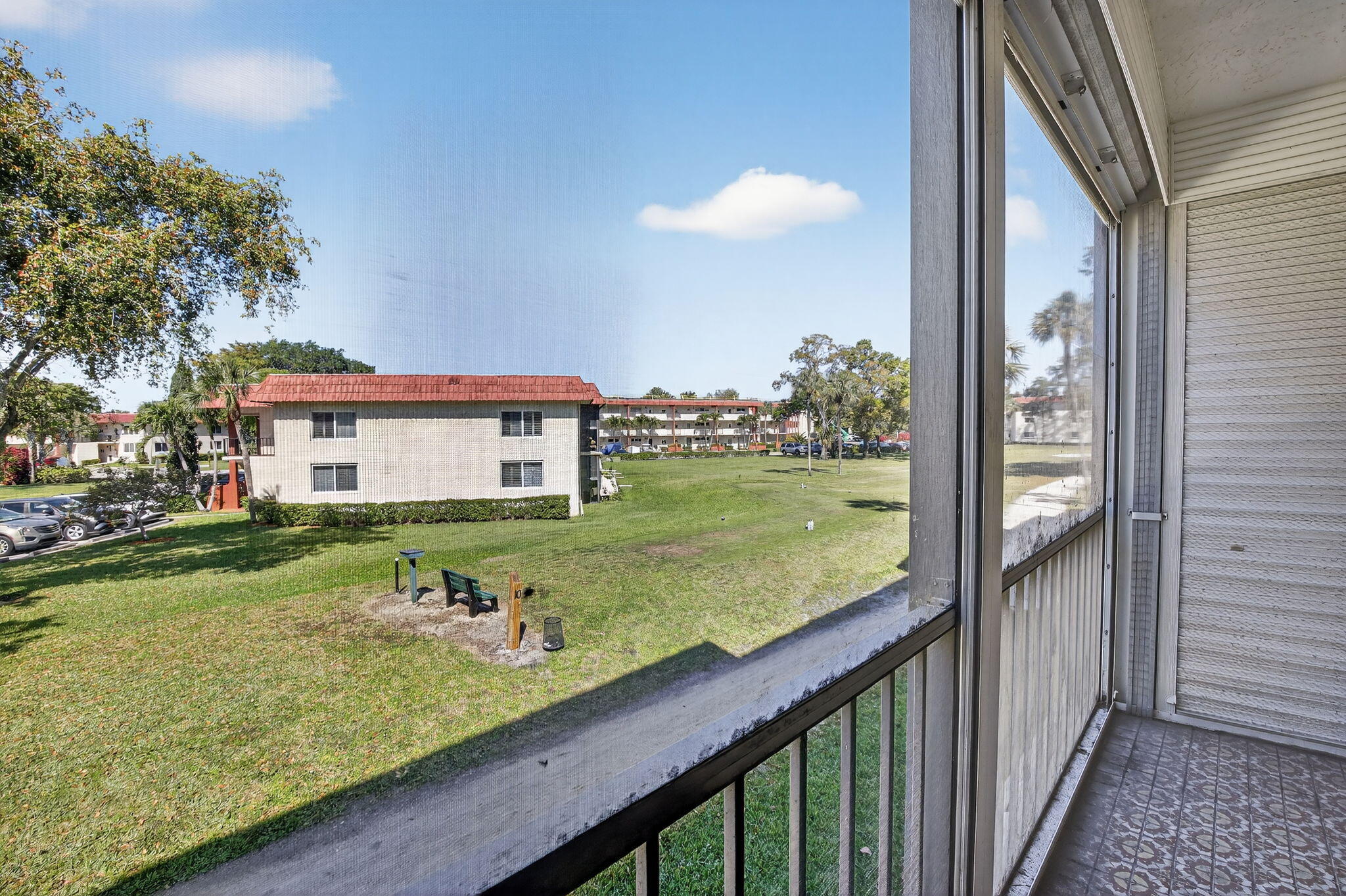 Full Two Bedroom On Par 3 Golf Course-Close To B Gate And Steps To Pool-This Condo Needs Some Updating But The Flooring Is Done And All Windows  And Slider Have Code Hurricane Shutters For Protection-Has A Paid Up Rec Lease-May Have One Pet To 20 Lbs-