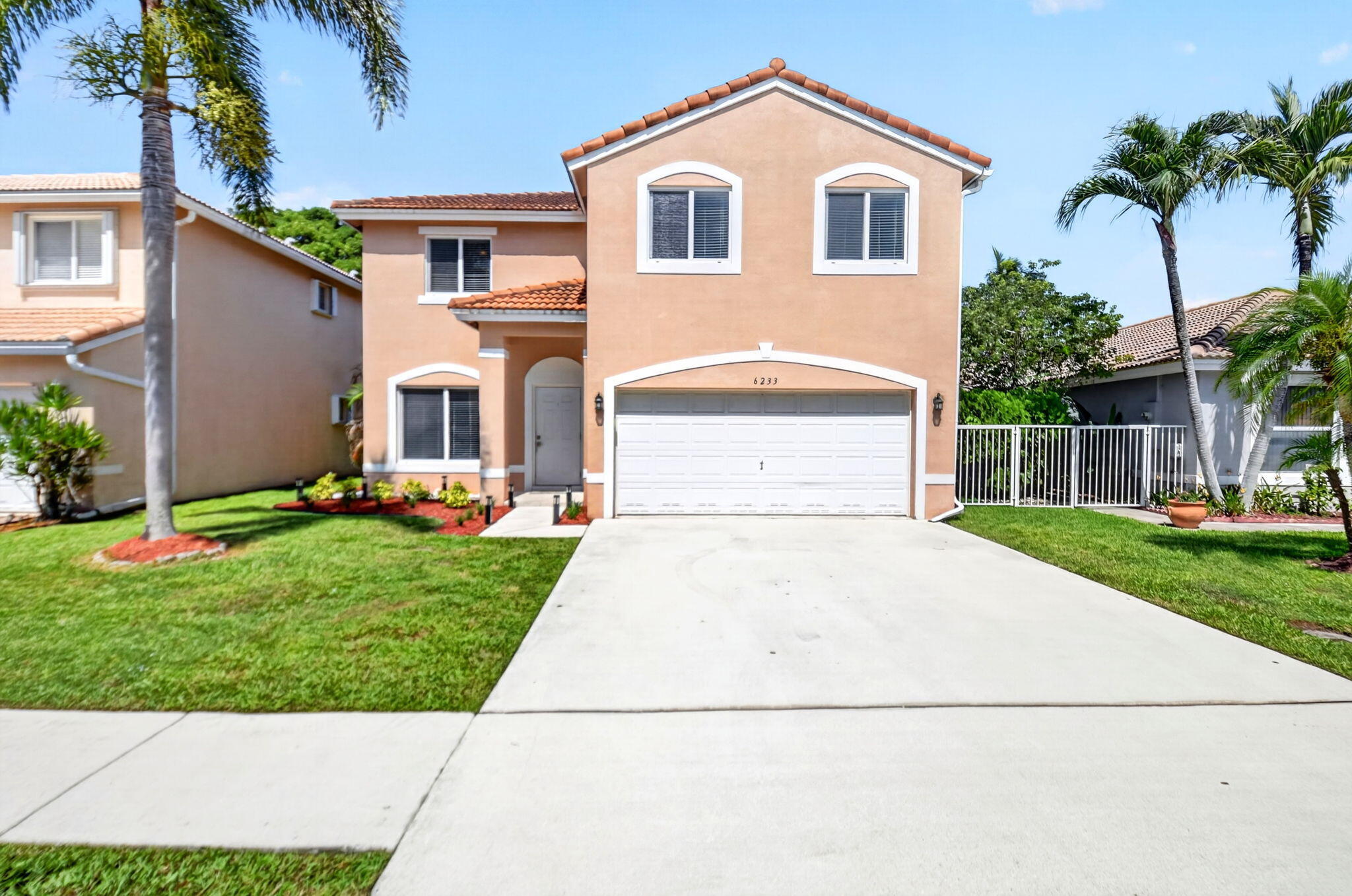 Welcome to this beautiful waterfront single-family home in the highly desirable Willoughby Farms community of Lake Worth. This spacious two-story residence offers 5 bedrooms, 2.5 bathrooms, and 2,353 square feet of thoughtfully designed living space, providing plenty of room for family, guests, and everyday living. Step outside to your own private backyard retreat, featuring a sparkling swimming pool overlooking the lake, an ideal setting for relaxing, entertaining, or enjoying the Florida sunshine year-round. Inside, you'll appreciate the home's functional layout, generous living spaces, and the convenience of a two-car garage with room for parking and storage. Whether you're looking for space to grow, accommodate a home office, or host family and friends, this home has it​​‌​​​​‌​‌​​​‌‌​​​‌‌‌​​‌​​‌‌​​​​ all.