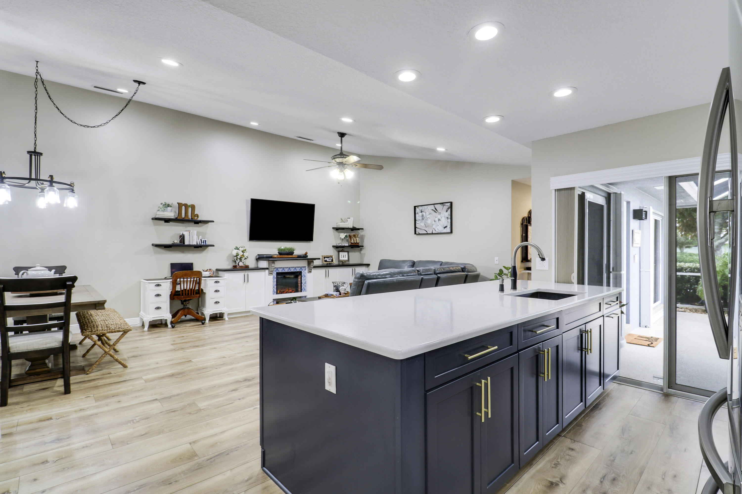 Move-in ready! This fully renovated 2Bed 2Bath CBS Florida Villa features a Custom Kitchen, Luxury Flooring, a Custom dining Banquette, a Stunning Electric Fireplace and Accordion Shutters, to mention a few. Enjoy a true "Lock-and-Leave" lifestyle with an HOA that covers building insurance (Roof & Exterior) making it an exceptional value, all exterior maintenance, and amenities. Perfect as a Seasonal Retreat or Permanent Florida Home —schedule your tour today!  Furniture negotiable.