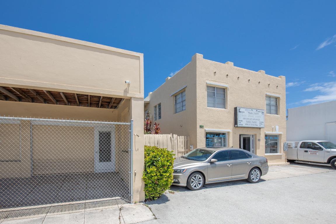 922 S Dixie consists of a retail/warehouse space originally made of 4 bays, still has 4 entrances and 4 meters.  Bathroom plus plumbing for possible additional baths.  This parcel also includes 921 S J St, a 4 bedroom 2 bath home with laundry room, updated kitchen, garage and 2 off street parking spaces.  And 928 S Dixie Hwy is also a retail/warehouse plus office and bath plus garage.  All this close to downtown and I95, great traffic on Dixie Hwy.