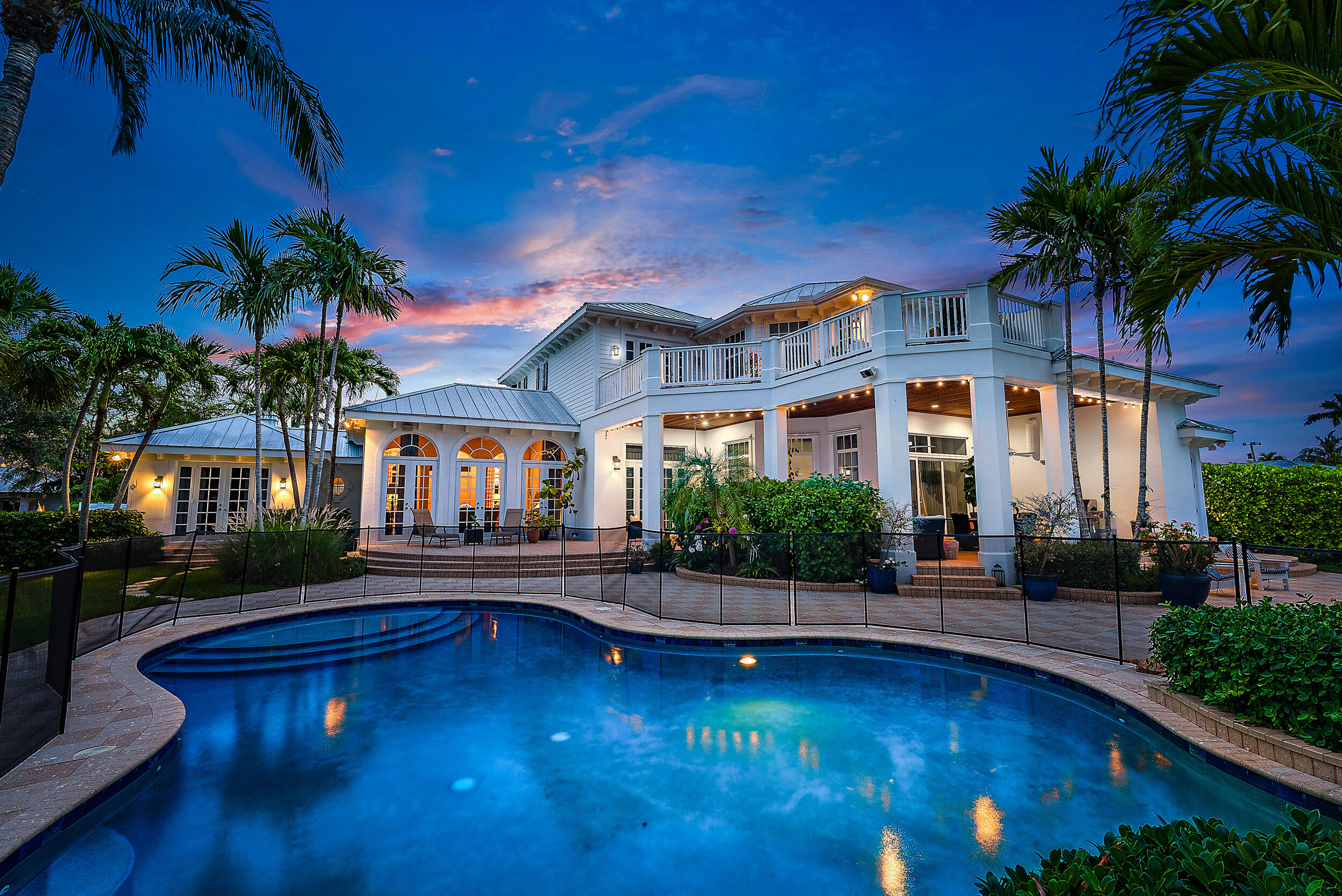 YACHT DOCKAGE in the Desirable Village of North Palm Beach! This 'Key West meets Palm Beach' home beautifully blends luxury + comfort. Located on a prime deep water lot in the Village this Masterfully built (2007) home offers CBS construction, Impact Windows and Doors + enchanting outdoor living. A grand circular drive and welcoming front porch greet you. Formal living room w/ arched floor to ceiling windows, custom molding and gas fireplace is tasteful + elegant. Timeless design elements include marble + wood flooring in main living areas, freshly painted interior/exterior, grand chef's kitchen w/ highest end appliances, butler's pantry and a new elevator. The large family room opens to a covered lanai, one of many scenic outdoor spaces, including a fenced nearly 1/2 Acre backyard. The Spacious primary suite boasts a morning bar, dual closets and a huge South facing veranda. There are two guest bedrooms w/ ensuite baths upstairs as well as a spacious 4th bedroom on the lower floor. Additional rooms include a downstairs office with water views and a HUGE Bonus room w/ bathroom over the garage. Outside, 96' of waterfront allows for yacht dockage (OR 2 boats) and easy ICW or Ocean access with No Fixed Bridges! Enjoy the lovely + friendly 'Village' lifestyle with numerous parks + marinas, the NPB Country Club. North Palm Beach has its own library, police + fire departments and is surrounded by waterfront properties on all sides.
Street legal golf carts are permitted and there are No HOA fees! Location is just minutes from PGA Boulevard, world class shopping, dining, educational and cultural venues. 20 minutes to PB Int'l airport and Palm Beach Island. There is truly no better place to live!