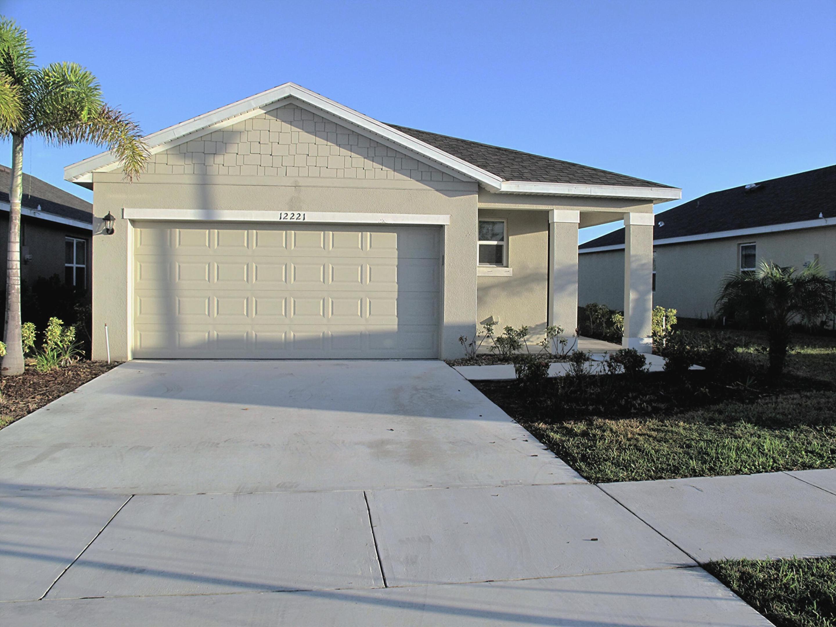 Experience the ultimate Florida lifestyle in this beautiful 1,614 sq. ft. single-family home featuring 3 bedrooms and 2 full bathrooms. The spacious Owner's Suite offers a walk-in closet, dual sinks, and a walk-in shower. The bright open-concept layout includes a formal dining area overlooking a gourmet kitchen with stainless steel appliances. Relax outdoors on the covered lanai with an expansive backyard. Enjoy modern features including a Wi-Fi garage door opener and Ecobee smart thermostat. Located in the sought-after Central Park community, just minutes from beaches, I-95, and the Turnpike. Community amenities include a resort-style pool, splash park, cabana, sports courts, walking trails, and dog park. Landscaping is included. Move-in ready—schedule your private tour today!