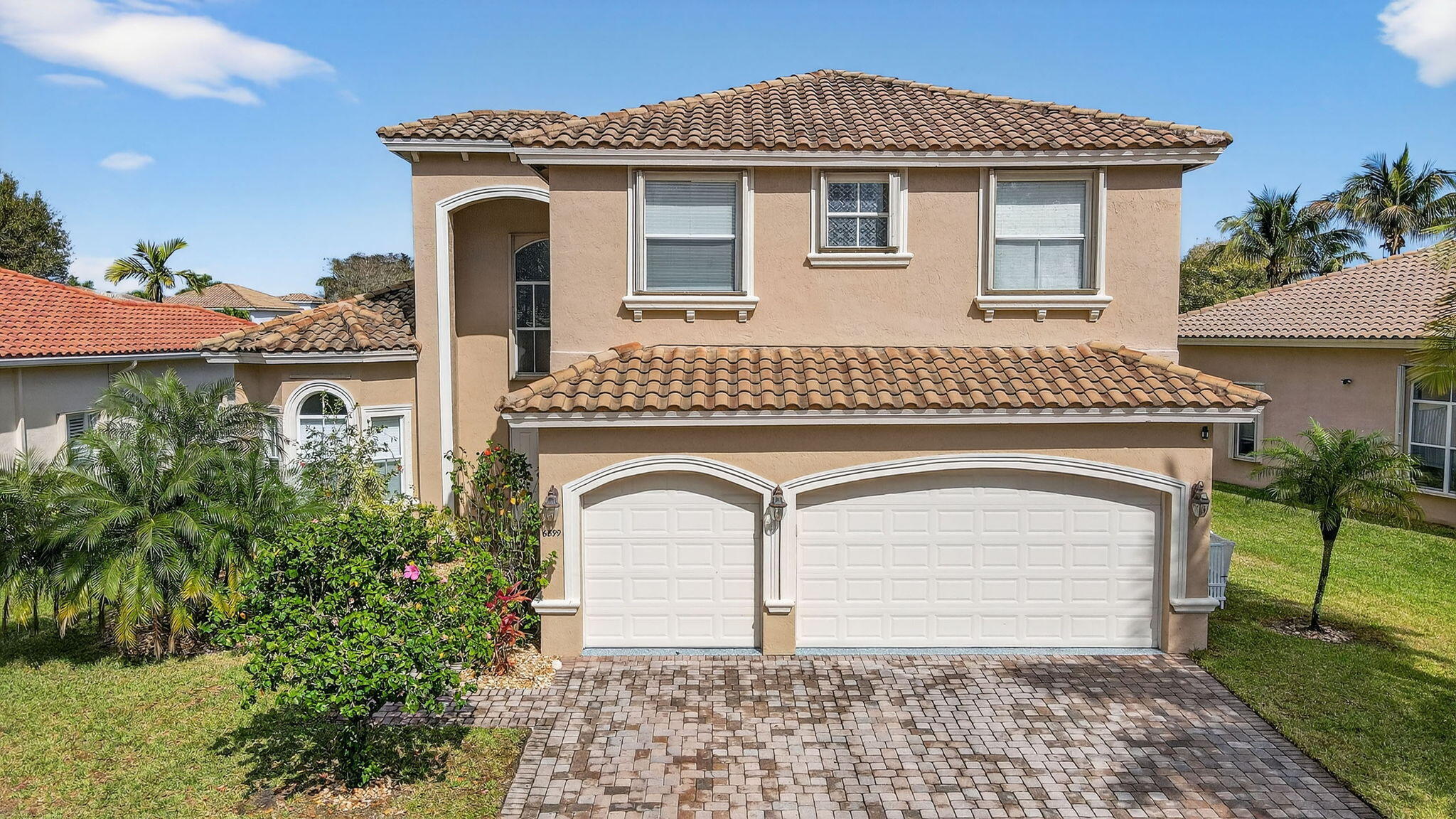 Don't miss this large, waterfront home in the Grande Estates section of Journey's End! Versailles model includes a stunning 2-story entryway and living room, first-floor primary suite (currently used as podcast / streaming studio), formal dining room and open kitchen/family room. Renovated kitchen opened to dining room with updated cabinets, hardware, and a huge island with new countertop. New paint and flooring throughout. Second floor features "mini master" bedroom with en-suite bath, huge loft, and 2 bedrooms with shared bath. Office/5th bedroom has double door entry. No HOA approval process and no waiting period to rent out! Monthly fee of $420 includes basic cable and internet. Beautiful clubhouse and amenities with pool, fitness center, tennis, basketball, playground & more.
