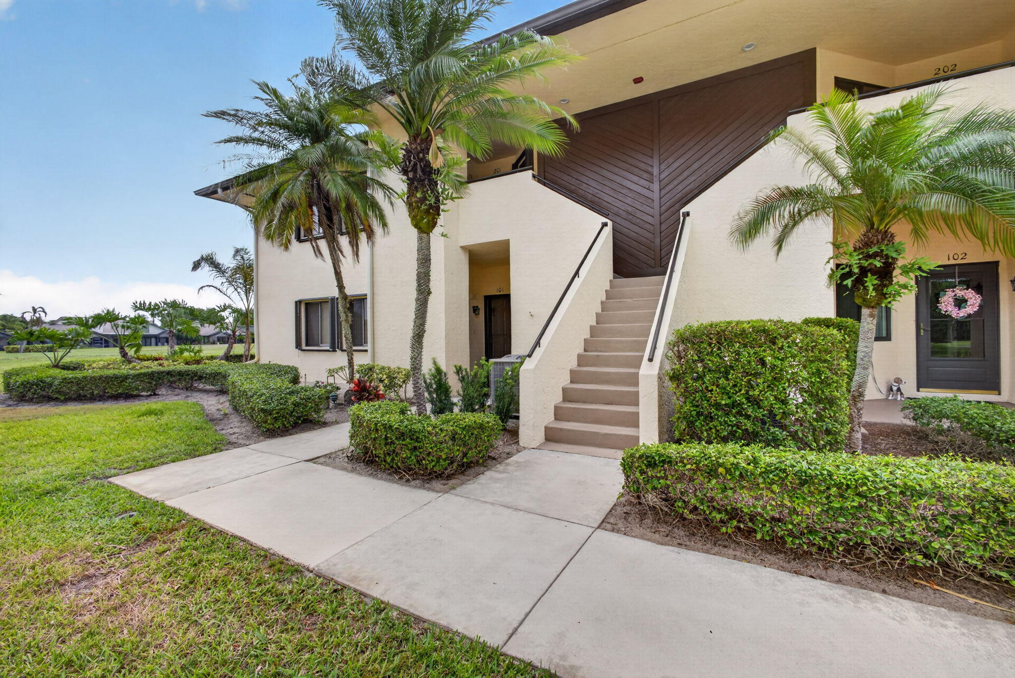 Welcome to this bright and spacious 3 bedroom, 2 bathroom corner unit condo in the desirable Williamsburg at Heritage Ridge community in Hobe Sound. Located on the second floor, this residence offers extra natural light, a functional layout, and peaceful golf course views from the private screened porch. The flexible third bedroom is perfect for guests, a home office, or den. Features include newer appliances, ceiling fans throughout, covered carport parking, full hurricane protection with convenient roll down shutters, and extra storage. Enjoy 2 community pools, hot tub, tennis courts, pickleball, shuffleboard, and social events throughout the year. Pay to play golf with memberships available but not required. Conveniently located near beaches, shopping, and dining.