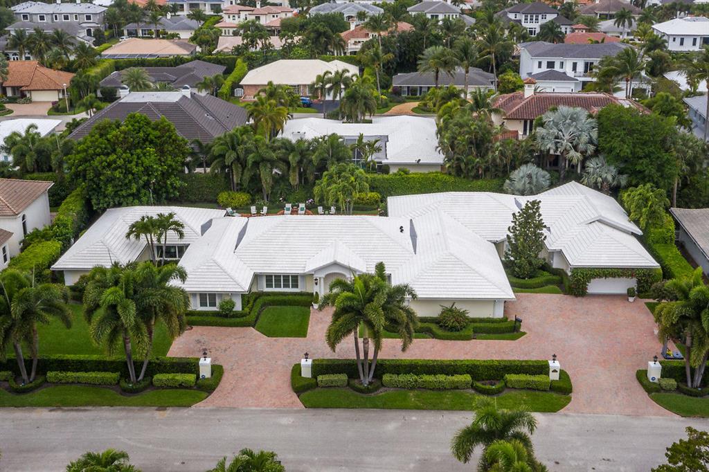 Highly desirable, rare, Palm Beach style home on a double interior lot in the heart of Royal Palm Yacht and Country Club. Property has been renovated featuring chefs kitchen, club room, natural gas generator, huge backyard with lush landscaping and much more.