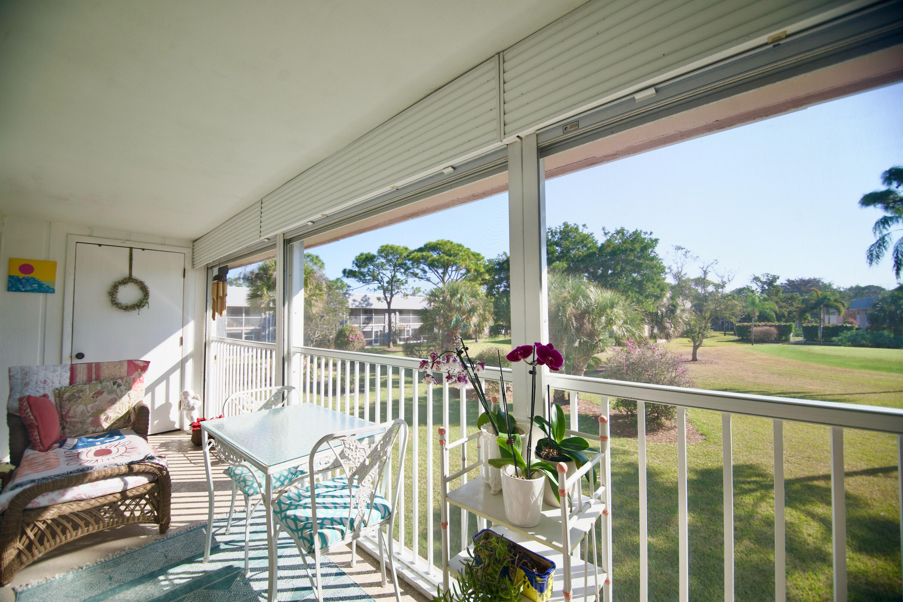 Experience the quintessential Florida lifestyle in Little Club, a premier 55+ community in Northern Jupiter. This light and bright residence overlooks the 2nd hole fairway and lush green space, offering stunning sunrise views from a spacious screened patio. Interior highlights include a remodeled primary shower and updated appliances (refrigerator, dishwasher, and water heater). Little Club provides an unparalleled social atmosphere with a 9-hole golf course, pickleball, fitness classes, and a vibrant calendar featuring trivia, happy hours, and social games. Turn-key living in a location that has it all.