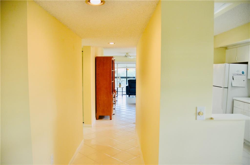 MOVE-IN READY! *NEWER PLYMOUTH BUILDING * LARGE MAGNOLIA MODEL LOCATED ON THE CORNER 3RD FLOOR WITH PLENTY OF NATURAL LIGHT AND BEAUTIFUL POOL VIEW * TILED THROUGHOUT MAIN LIVING AREA * SPACIOUS MASTER BEDROOM WITH CUSTOM PLEATED SHADES WOOD BLINDS, AMPLE WALK-IN CLOSET WITH BUILT-IN ORGANIZER * WASHER AND DRYER IN THE UNIT ** VERY CLOSE TO THE POOL AREA *SCREENED-IN BALCONY * HURRICANE ACCORDION SHUTTERS ON ALL WINDOWS *THIS RESORT-STYLE 55+ COMMUNITY OFFERS MANY AMENITIES AND DAILY ACTIVITIES TO IT’S RESIDENTS, MULTIPLE POOLS, GYMS, MOVIE THEATER, BILLIARDS, CLUBHOUSE, GOLF, LOCAL SHUTTLE SERVICES & MUCH MORE! * HOA FEES INCLUDE WATER, CABLE & WIFI