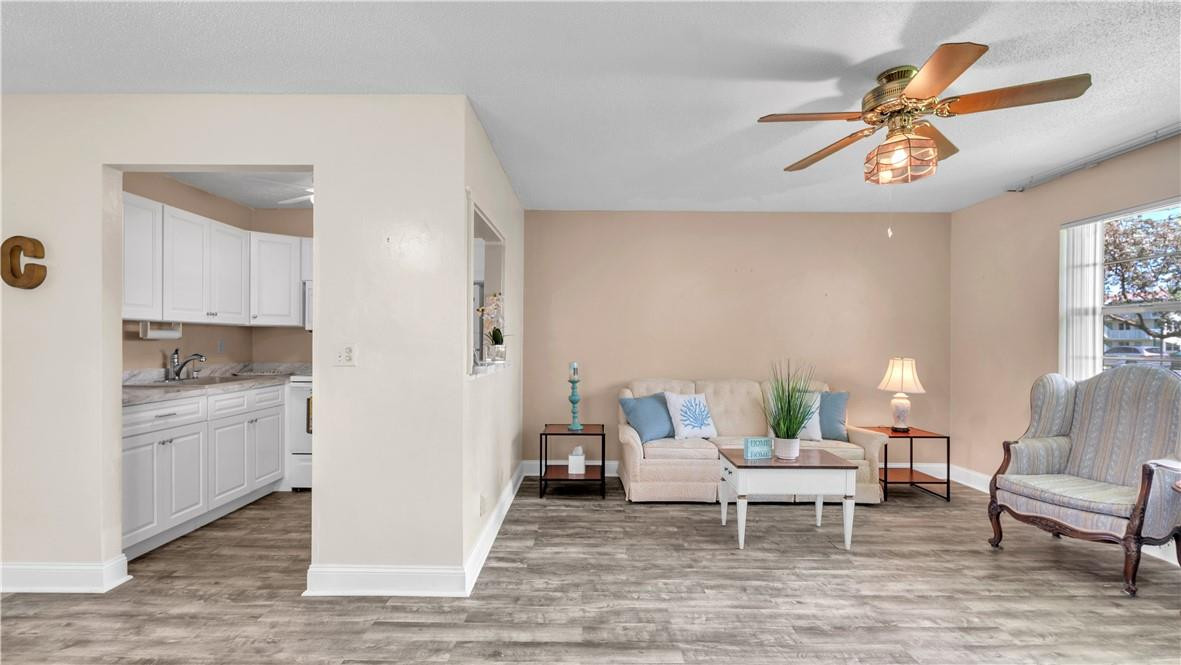 Welcome to this stunning first-floor corner condo located in intercostal community & walking distance to the beach. Meticulously maintained, reflecting the pride and dedication of its long-term owner, Recent Upgrades include new laminate floors, kitchen,& bathroom upgrades. Primary Bedroom Offers Two Walk-in Closets. Enjoy Easy access to various restaurants and attractions. As a resident of this community, you'll have access to an array of fantastic amenities. Take leisurely walks along the scenic paths by the intracoastal water, or challenge your friends to a round of mini-golf. Brand New Club House & Gate Coming Soon. Great for Snow Birds. The condo comes partially furnished. Schedule a viewing today & start living the peaceful & enjoyable lifestyle you deserve!