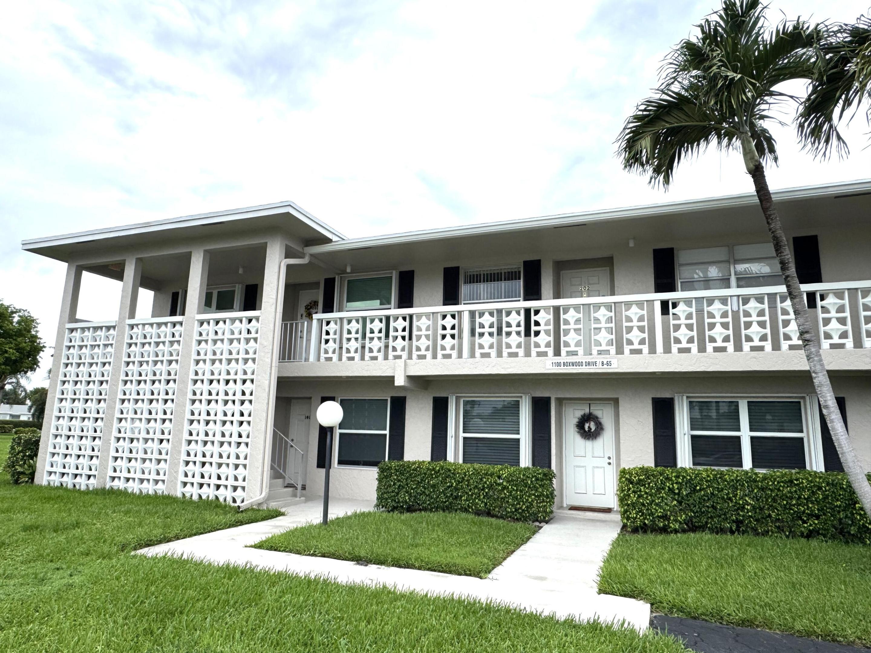 Welcome to this lovely updated first-floor condominium, offering 2 bedrooms and 2 full baths for annual rent. Located in a 55 plus community. Filled with natural light, this bright corner unit features 1,167 square feet of comfortable air-conditioned living space. The kitchen has been updated with refreshed cabinetry and a charming tile backsplash. Recent improvements include a new AC system installed in 2021, smooth ceilings, and a beautifully remodeled primary bath. An in-unit washer and dryer add everyday convenience. Pocket doors in the second bedroom create a flexible space that works beautifully as a den, guest room, or home retreat. Start your day with coffee on the spacious screened patio, where windows frame peaceful views of the surrounding greenery.  The generous sized living and dining area offers extra storage with a convenient closet. There is patio space just outside the unit in front which could be perfect for relaxing with a book or a cup of tea. Rent includes water, cable, and internet, so you'll only need to cover electricity. Set within the active adult community of The Pines of Delray, residents enjoy a welcoming lifestyle with resort-style pools, a hot tub, sauna, community room, card rooms, shuffleboard, on-site management, and more. Please note that community management requires a minimum credit score of 650, and pets are not permitted. Conveniently located near the beach, restaurants, shopping, major highways, and the airport, this home offers both comfort and accessibility. All information published and provided including but not limited to measurements, features, finishes, etc., are subject to errors and omissions. All such information should be independently verified by all parties who should perform their own due diligence to verify all information. The listing company expressly disclaims any warranty or representation regarding such information.