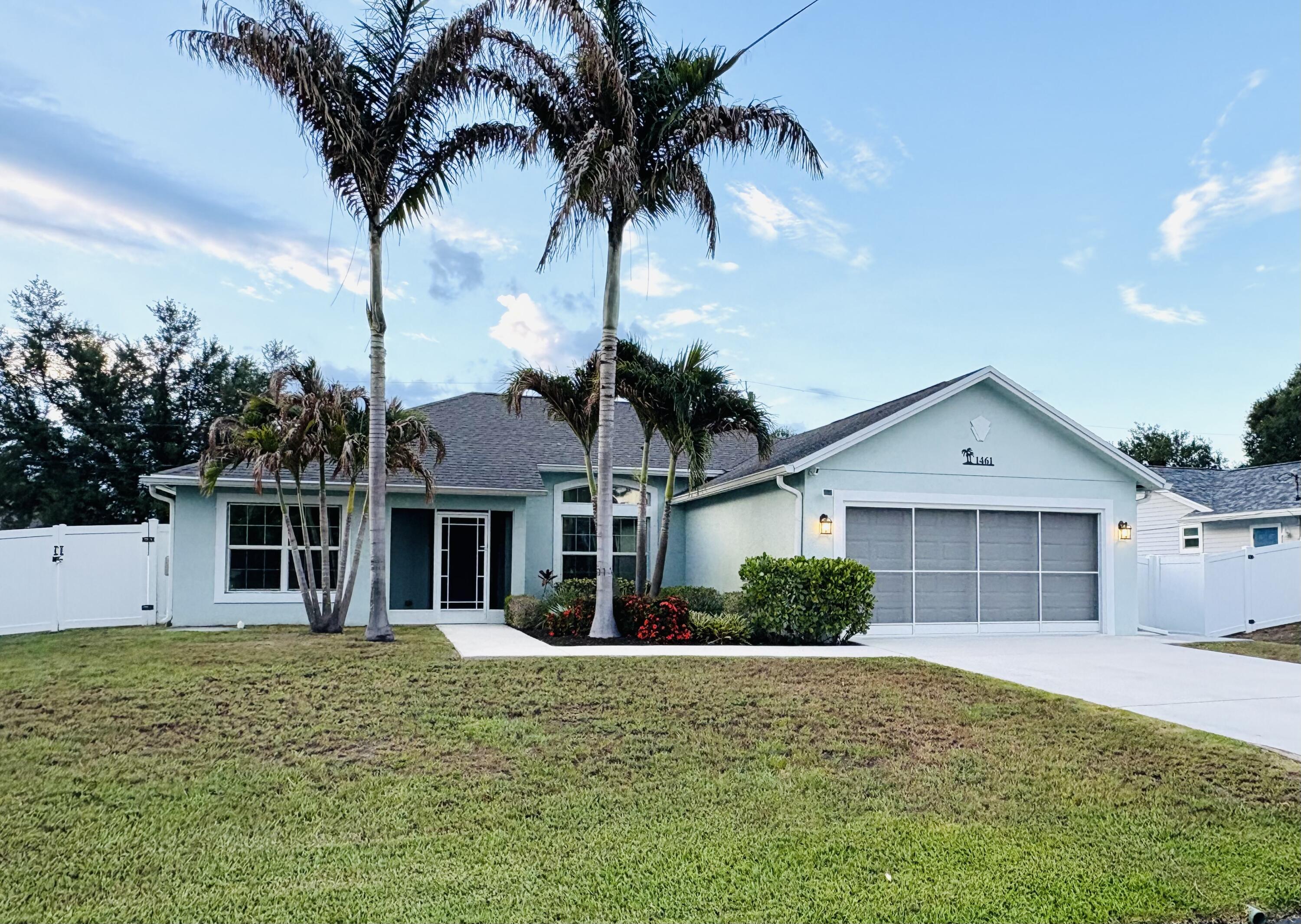 Welcome home to this beautifully maintained 3-bedroom, 2-bathroom CBS (concrete block) home built in 2017 and located in one of Port St. Lucie's most desirable non-HOA neighborhoods. Offering the perfect combination of quality construction, modern upgrades, and outdoor space, this move-in-ready home is ideal for anyone seeking comfort, convenience, and freedom from HOA restrictions. Pride of ownership shines throughout this one-owner home. The spacious split-bedroom floor plan features a beautifully updated primary suite with wood-look tile flooring, new baseboards, and a custom closet system. Bedrooms two and three have been upgraded with luxury vinyl plank flooring, providing both style and durability. The kitchen is equipped with a newer dishwasher, while the home's HVAC system has  been professionally serviced every six months since construction, offering peace of mind for the next owner. Impact windows and doors provide year-round storm protection, while accordion shutters on the rear French doors offer additional security. Exterior doors were freshly painted in 2026, adding to the home's curb appeal. Situated on an oversized quarter-acre lot, the backyard offers endless possibilities with plenty of room for a custom pool, outdoor entertaining area, garden, or space to store your boat, trailer, or recreational toys. Additional features include a two-car garage, garage screen door, gutters with underground drainage, and a thoughtfully designed outdoor space. Conveniently located near shopping, dining, schools, parks, golf courses, and major commuter routes, this Port St. Lucie home delivers the Florida lifestyle buyers are searching for. If you've been looking for a newer construction home with impact glass, no HOA, and a large backyard, this is one you won't want to miss.