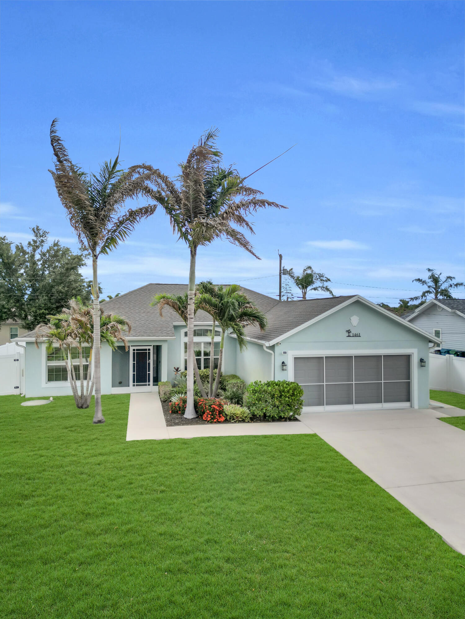 Welcome home to this beautifully maintained 3-bedroom, 2-bathroom CBS (concrete block) home built in 2017 and located in one of Port St. Lucie's most desirable non-HOA neighborhoods. Offering the perfect combination of quality construction, modern upgrades, and outdoor space, this move-in-ready home is ideal for anyone seeking comfort, convenience, and freedom from HOA restrictions. Pride of ownership shines throughout this one-owner home. The spacious split-bedroom floor plan features a beautifully updated primary suite with wood-look tile flooring, new baseboards, and a custom closet system. Bedrooms two and three have been upgraded with luxury vinyl plank flooring, providing both style and durability. The kitchen is equipped with a newer dishwasher, while the home's HVAC system has  been professionally serviced every six months since construction, offering peace of mind for the next owner. Impact windows and doors provide year-round storm protection, while accordion shutters on the rear French doors offer additional security. Exterior doors were freshly painted in 2026, adding to the home's curb appeal. Situated on an oversized quarter-acre lot, the backyard offers endless possibilities with plenty of room for a custom pool, outdoor entertaining area, garden, or space to store your boat, trailer, or recreational toys. Additional features include a two-car garage, garage screen door, gutters with underground drainage, and a thoughtfully designed outdoor space. Conveniently located near shopping, dining, schools, parks, golf courses, and major commuter routes, this Port St. Lucie home delivers the Florida lifestyle buyers are searching for. If you've been looking for a newer construction home with impact glass, no HOA, and a large backyard, this is one you won't want to miss.