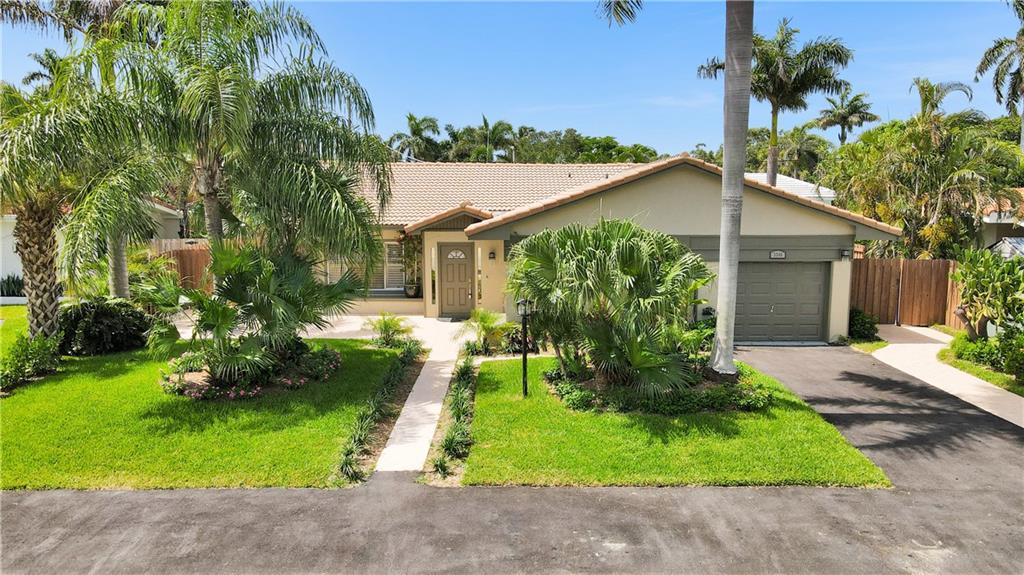 Say hello to Island Living! Located in the beautiful gated Grand Terra Mar Island. This recently renovated updated residence offers three bedrooms and three baths, an updated kitchen with quartz countertops, S/S appliances, new flooring, spa-like bathrooms, gorgeous private backyard oasis with lush landscaping and lots of room for entertaining. This hidden gem of a neighborhood is situated halfway between the Old Florida charm of Lauderdale by the Sea and the new state of the art Pompano beach pier, with all the new oceanfront restaurants & amenities.